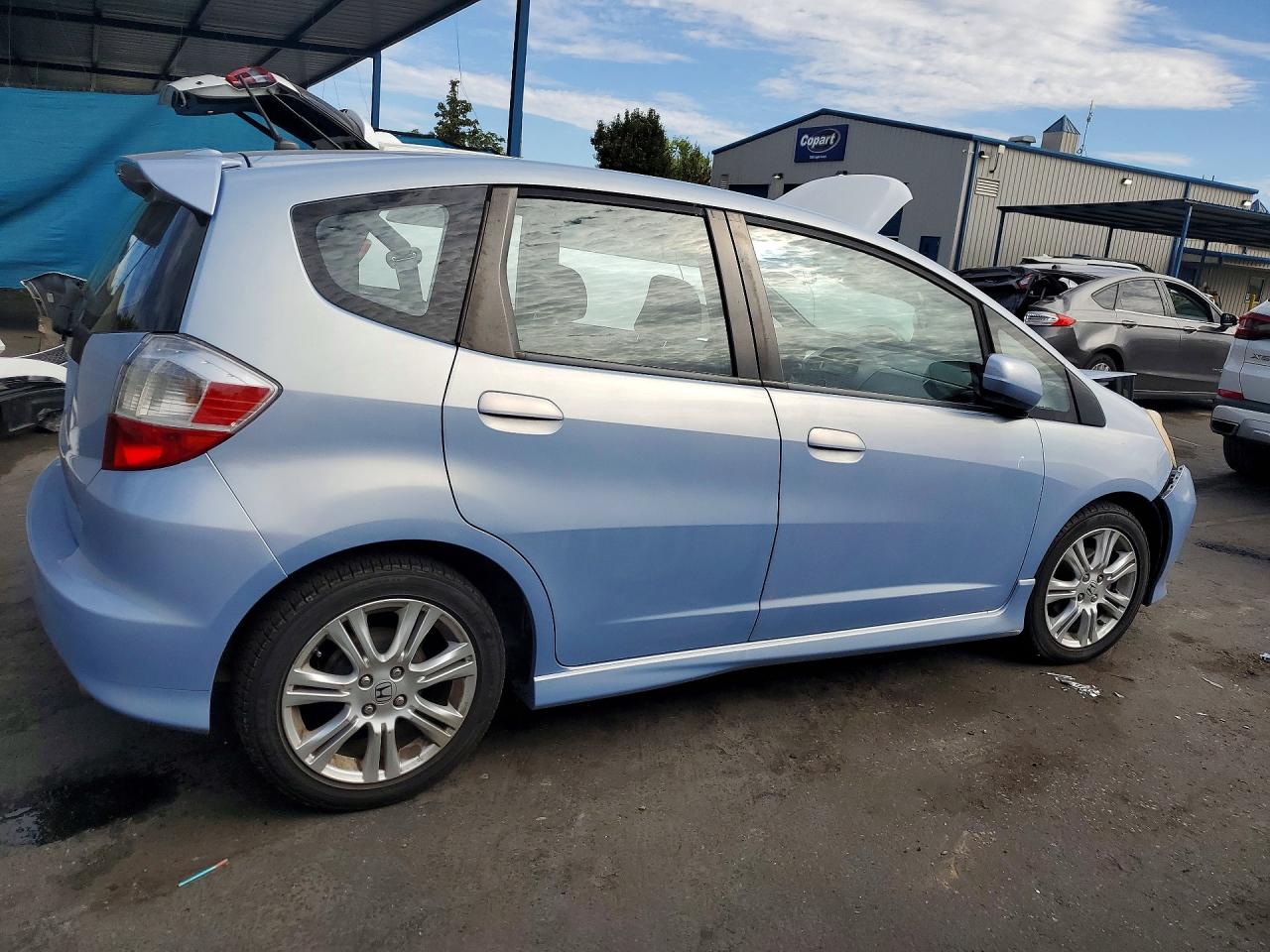 2009 Honda Fit Sport Blue vin: JHMGE88459S017222