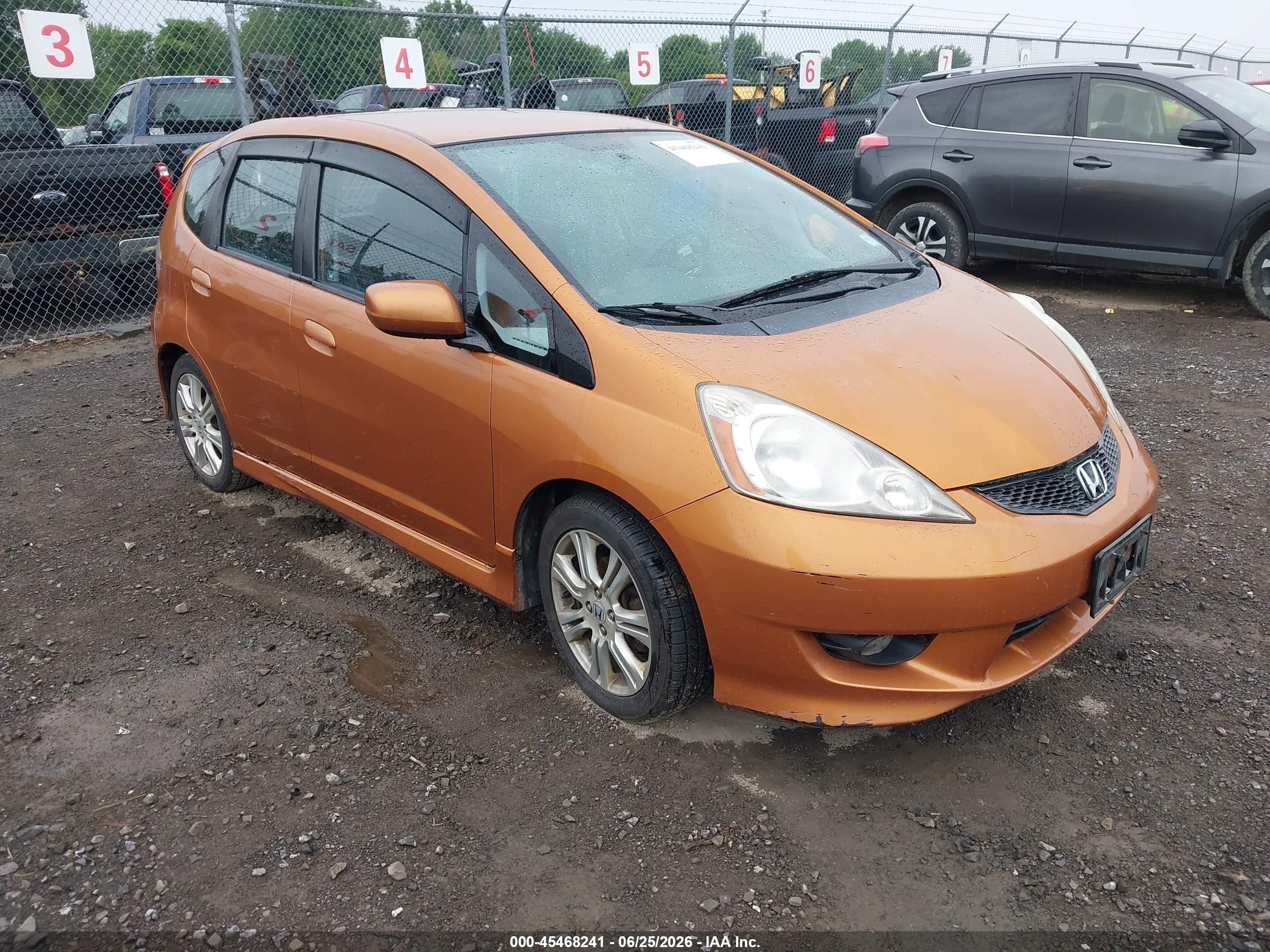 2009 Honda Fit Sport Orange vin: JHMGE88469S074349