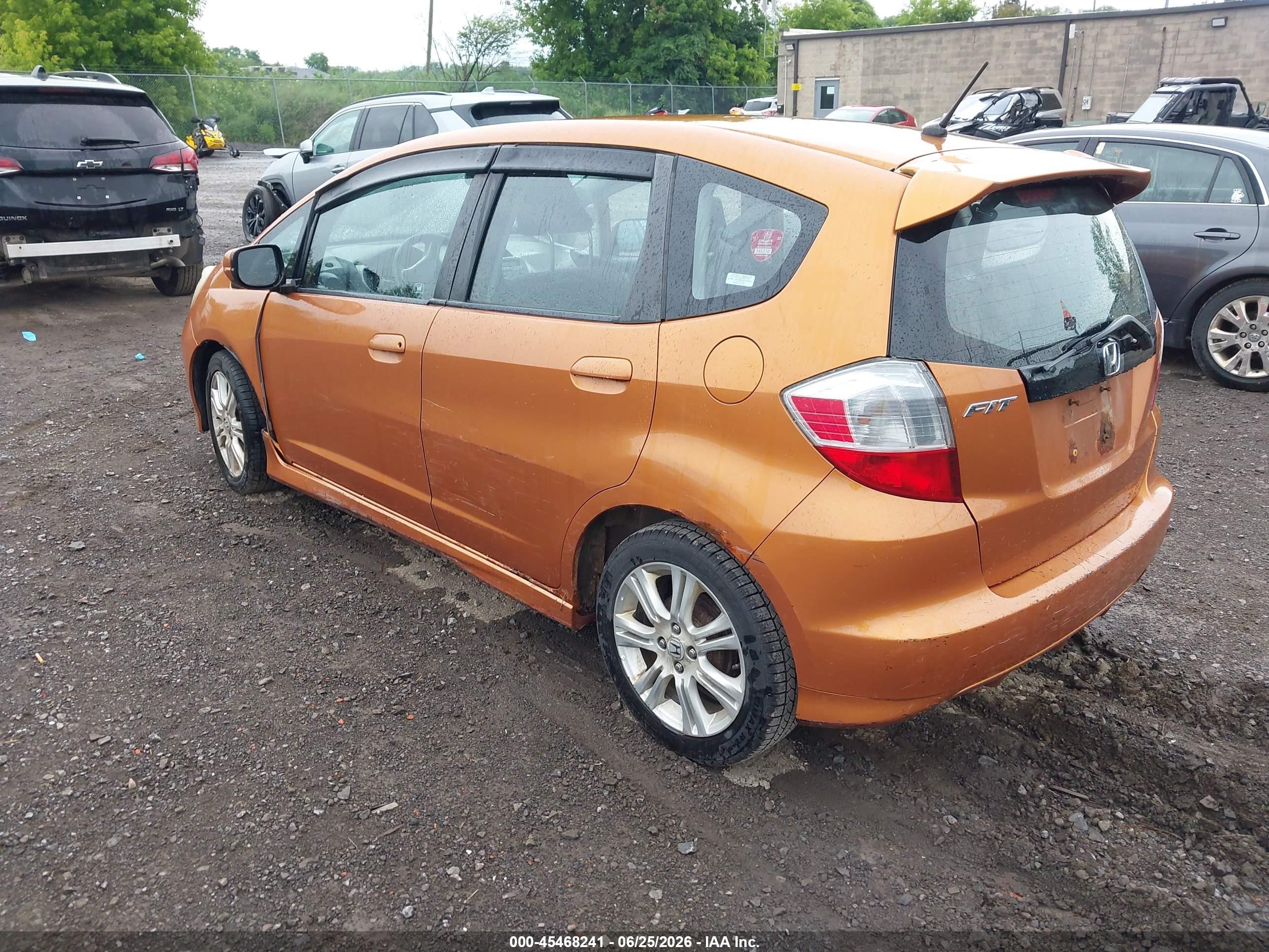 2009 Honda Fit Sport Orange vin: JHMGE88469S074349