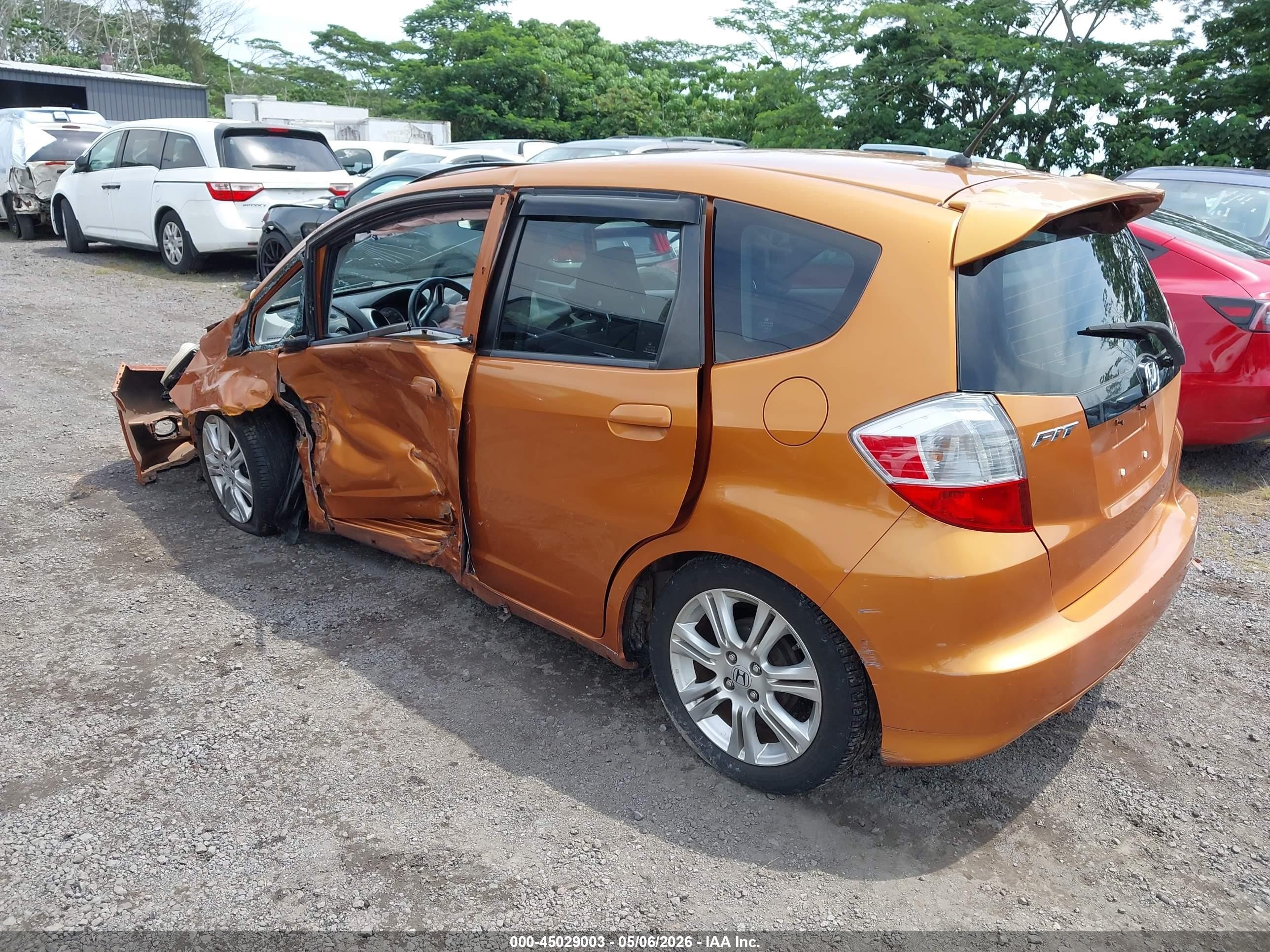 2009 Honda Fit Sport Orange vin: JHMGE88479S033695