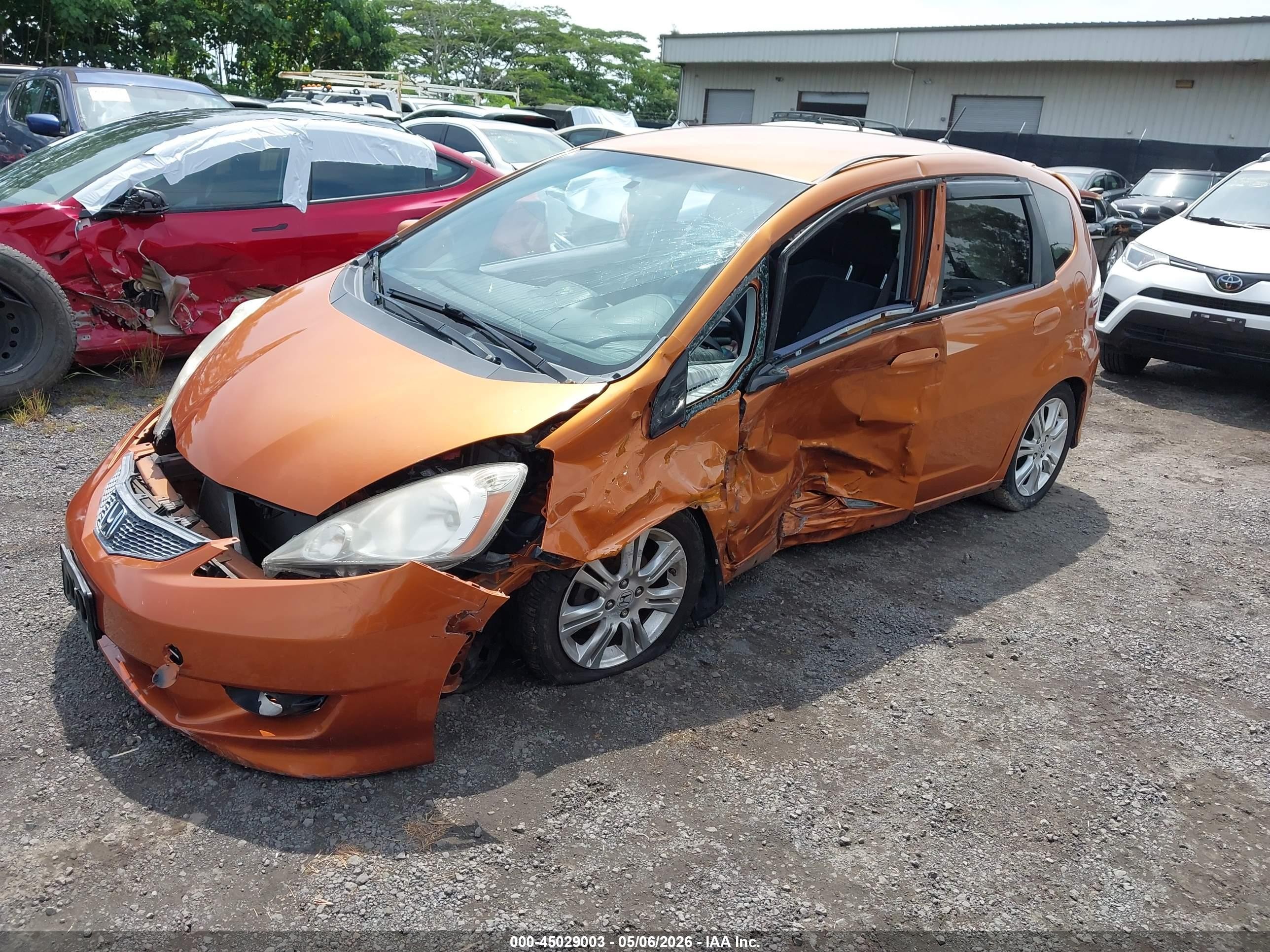 2009 Honda Fit Sport Orange vin: JHMGE88479S033695