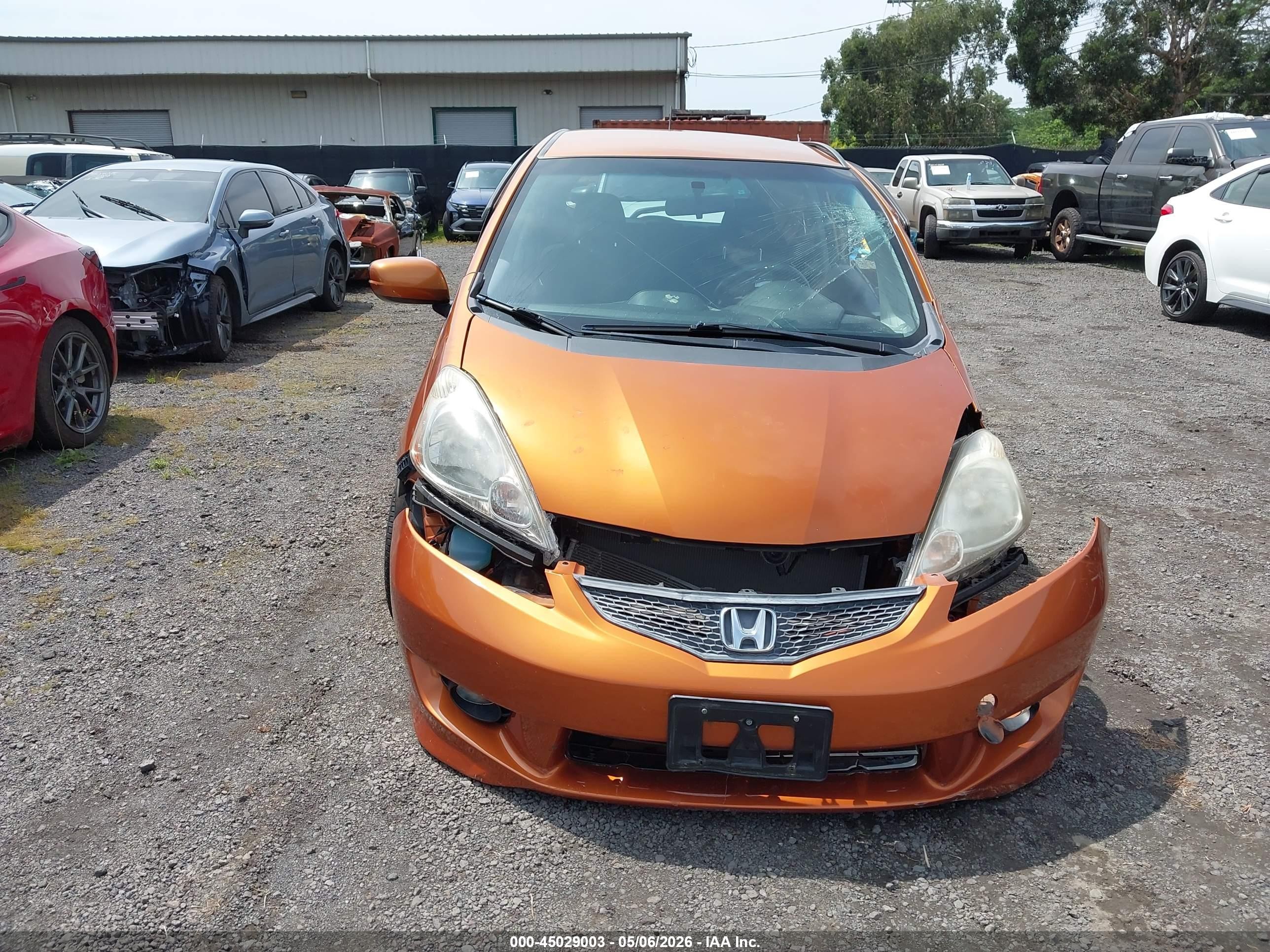 2009 Honda Fit Sport Orange vin: JHMGE88479S033695