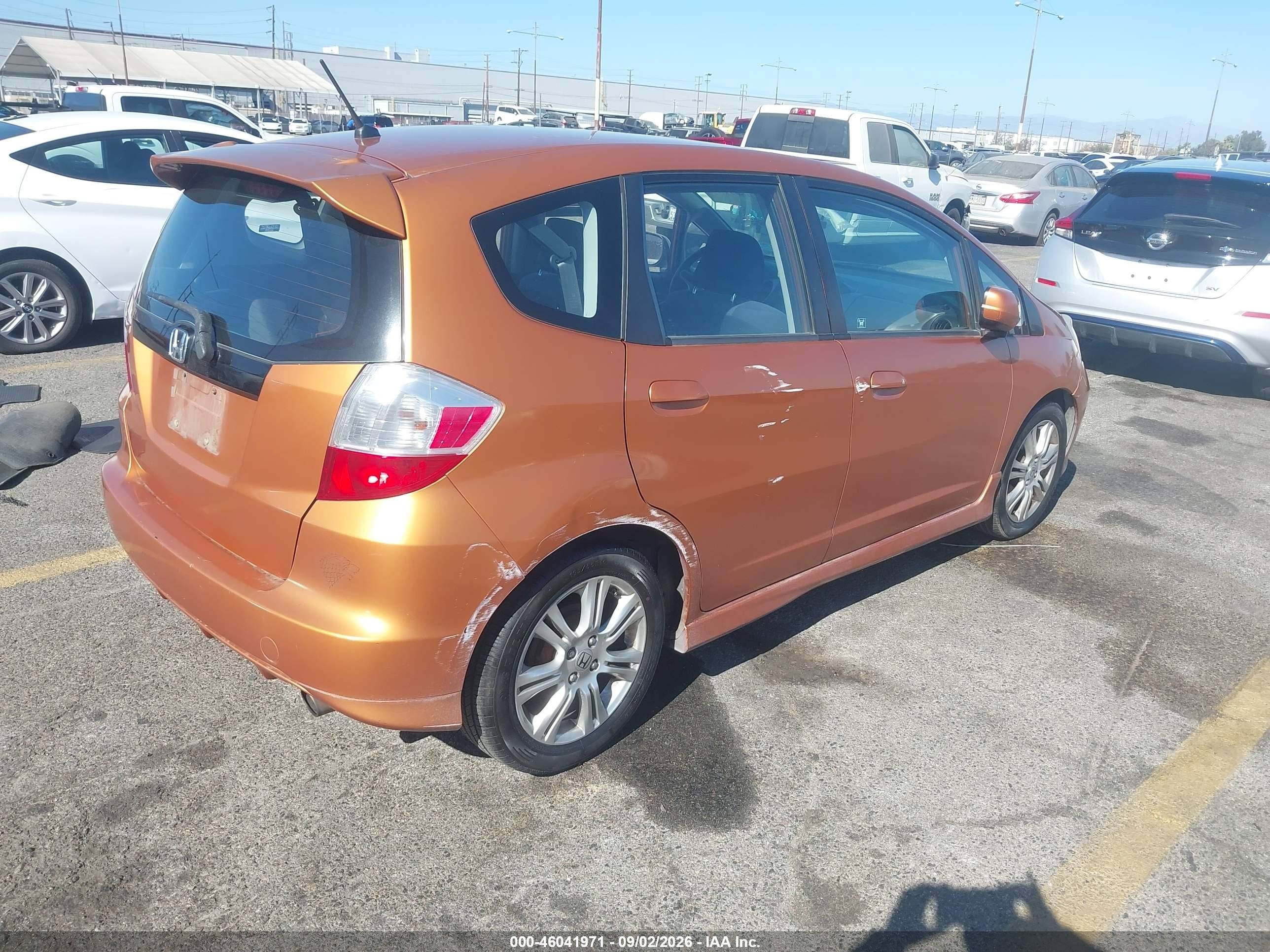 2009 Honda Fit Sport Orange vin: JHMGE88489S019630