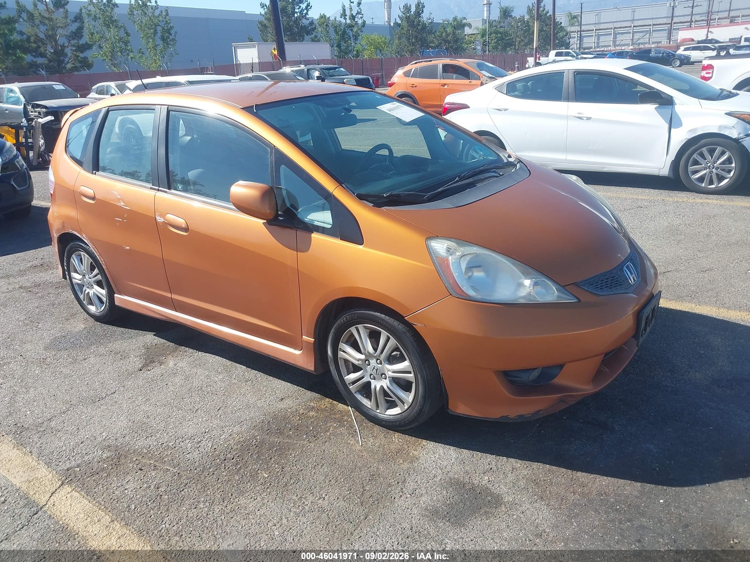 2009 Honda Fit Sport Orange vin: JHMGE88489S019630
