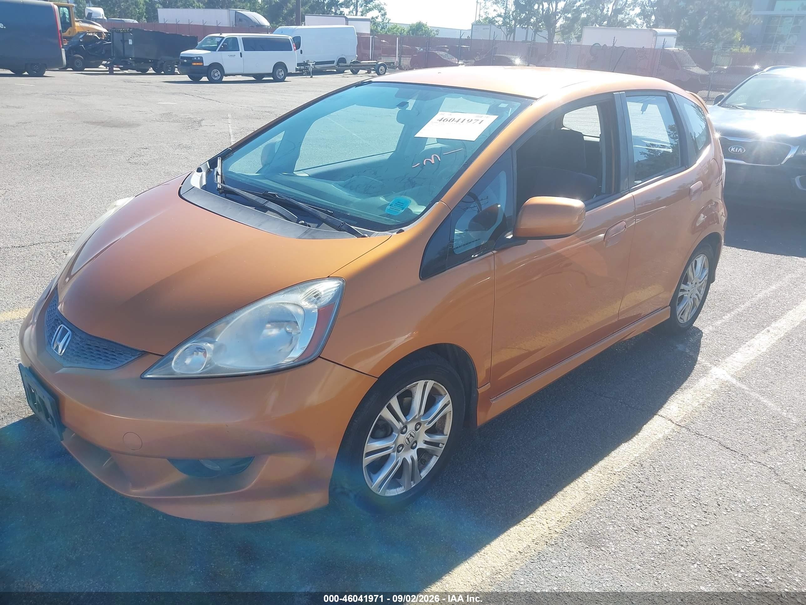 2009 Honda Fit Sport Orange vin: JHMGE88489S019630