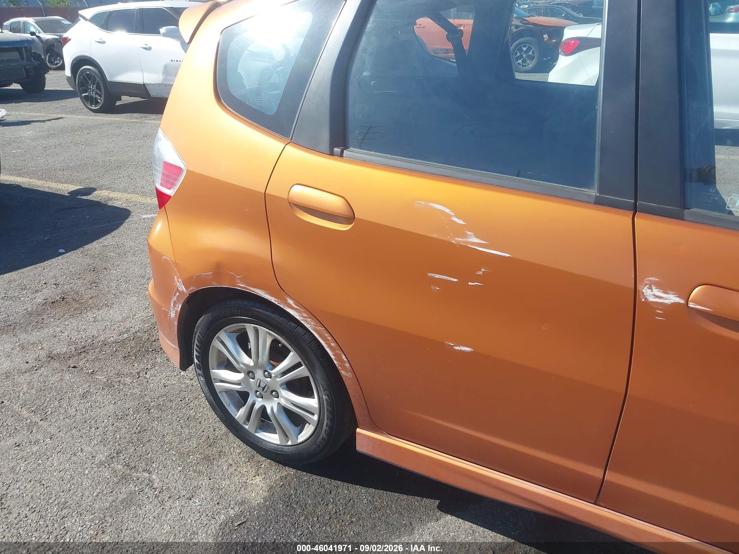 2009 Honda Fit Sport Orange vin: JHMGE88489S019630