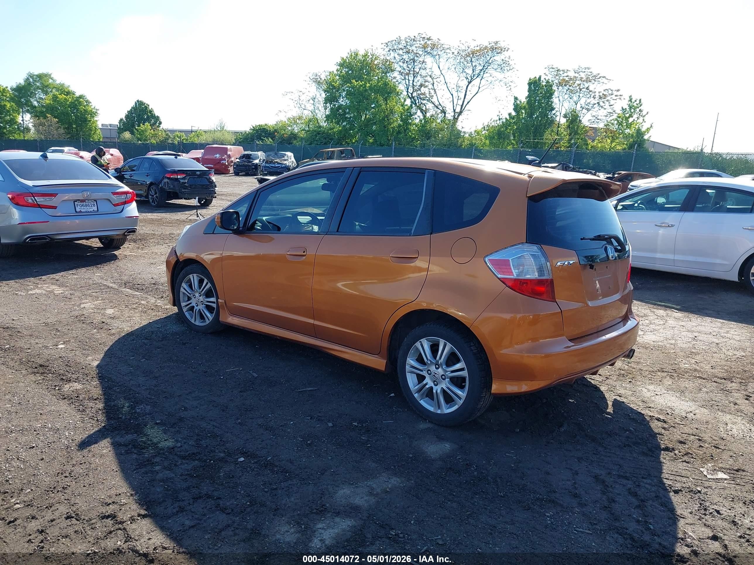 2009 Honda Fit Sport Orange vin: JHMGE88489S025377