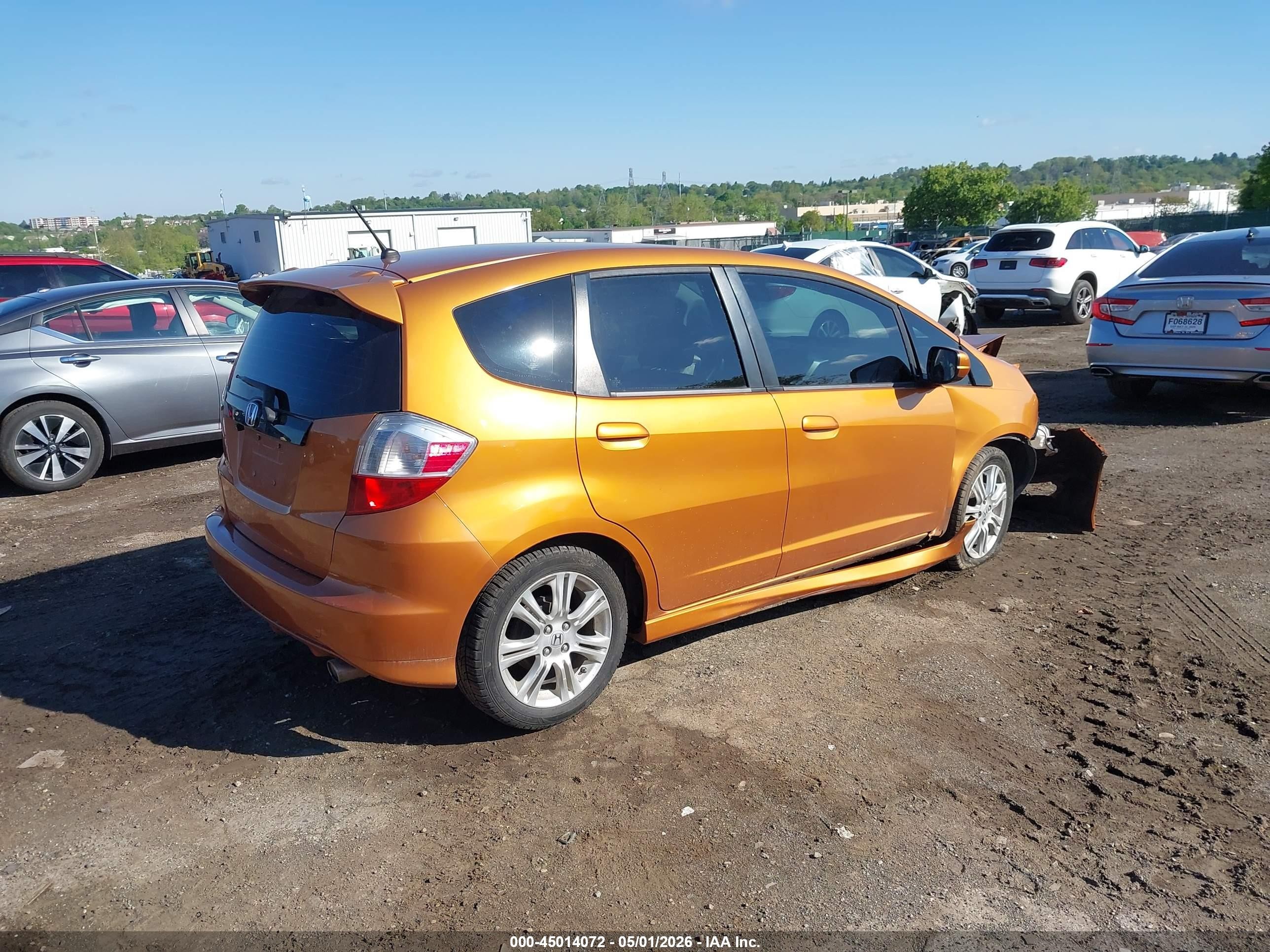 2009 Honda Fit Sport Orange vin: JHMGE88489S025377