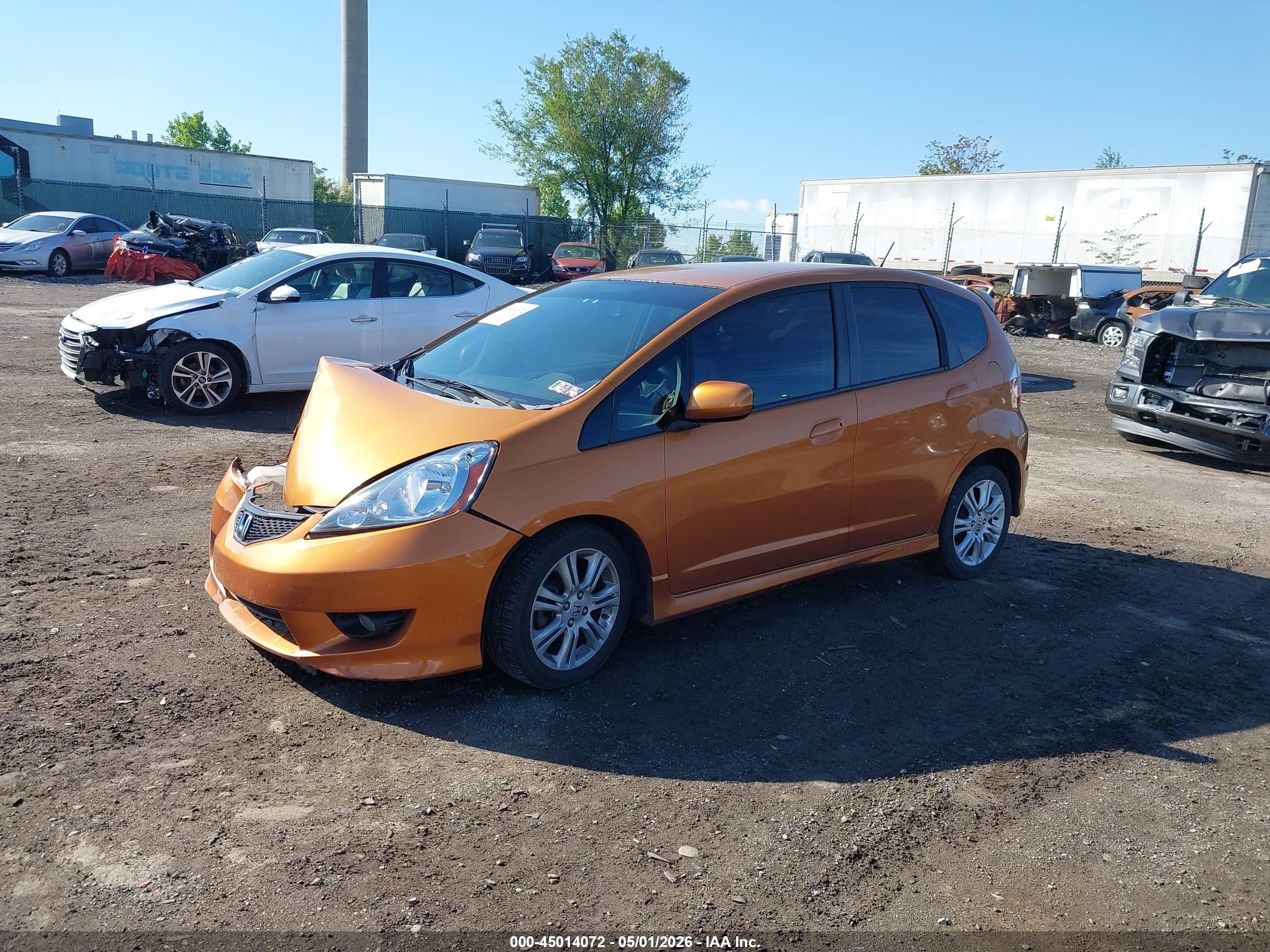 2009 Honda Fit Sport Orange vin: JHMGE88489S025377
