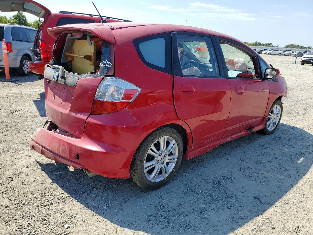 2009 Honda Fit Sport Red vin: JHMGE88499C000868