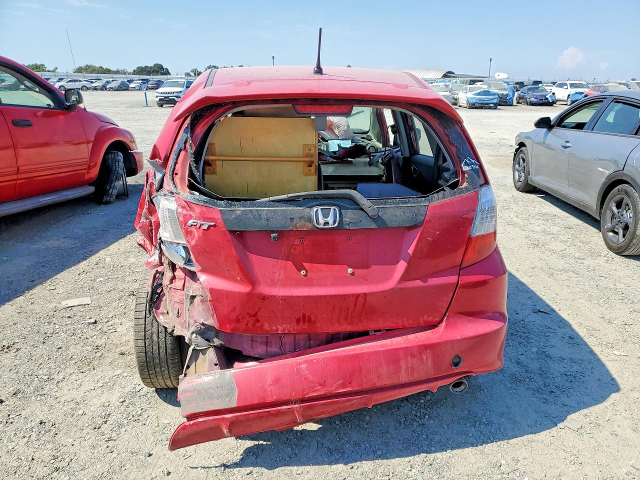 2009 Honda Fit Sport Red vin: JHMGE88499C000868