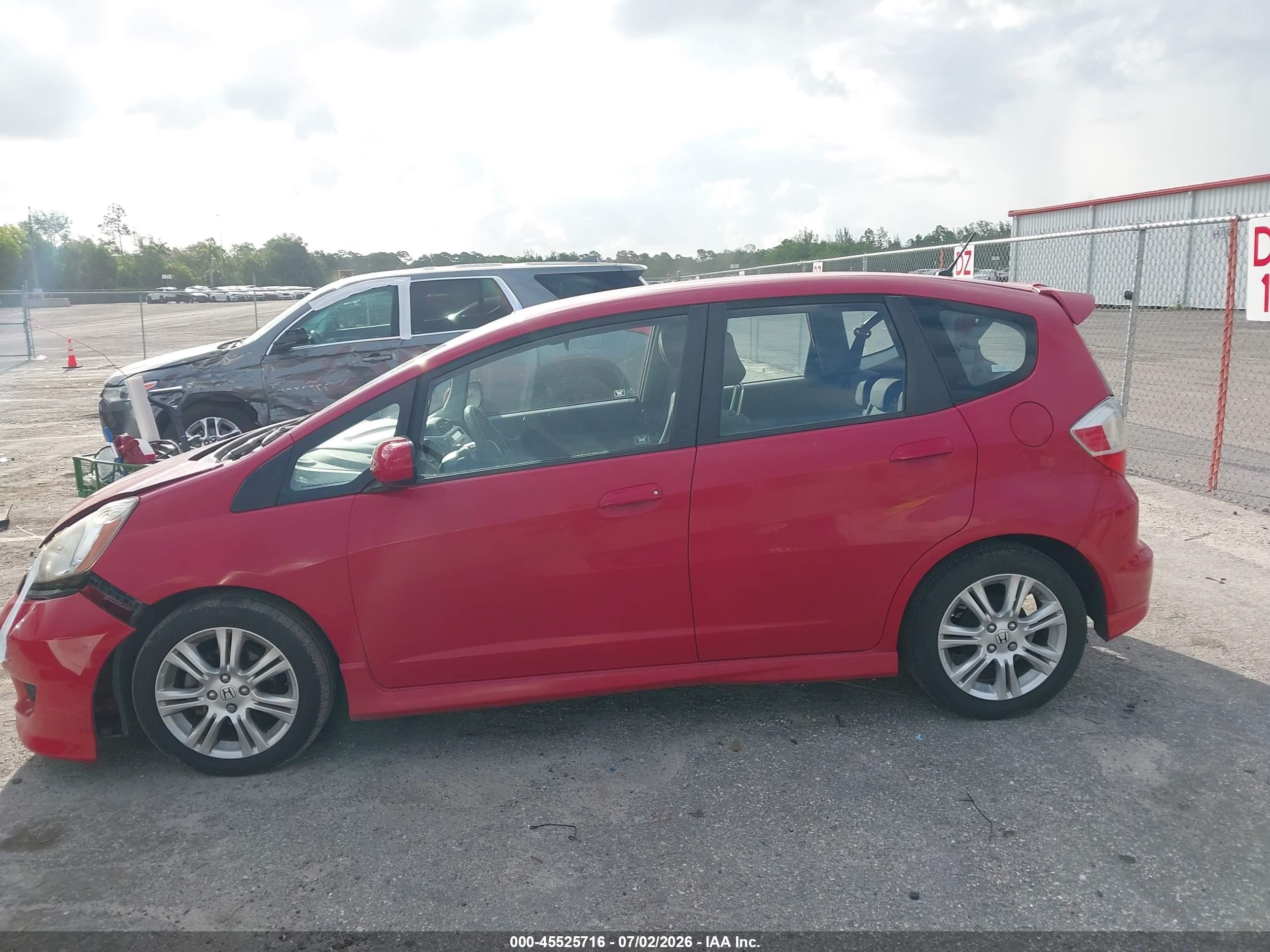 2009 Honda Fit Sport Red vin: JHMGE88499S014369