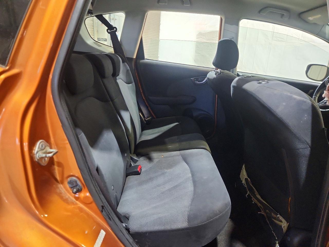 2009 Honda Fit Sport Orange vin: JHMGE88499S048490