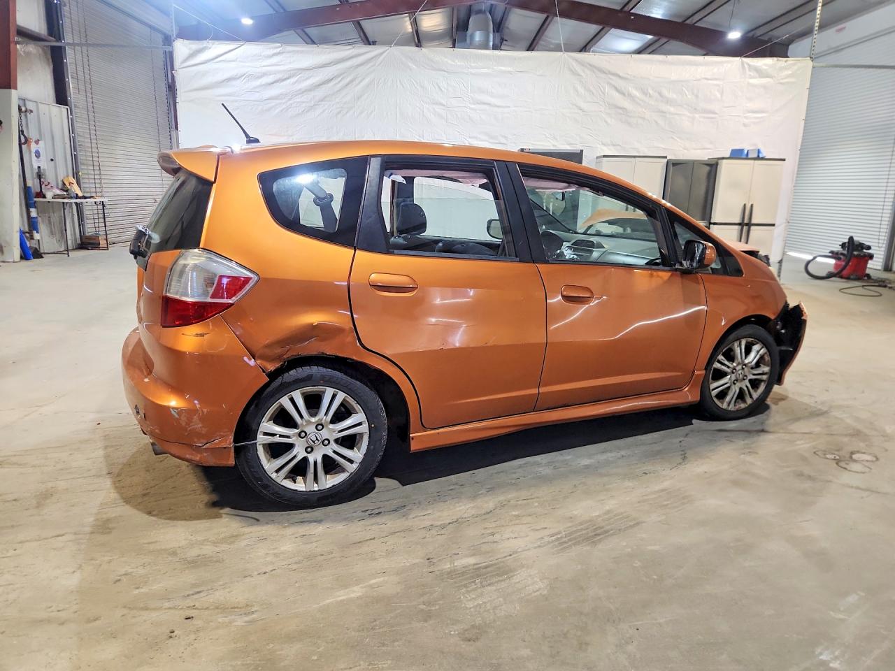 2009 Honda Fit Sport Orange vin: JHMGE88499S048490