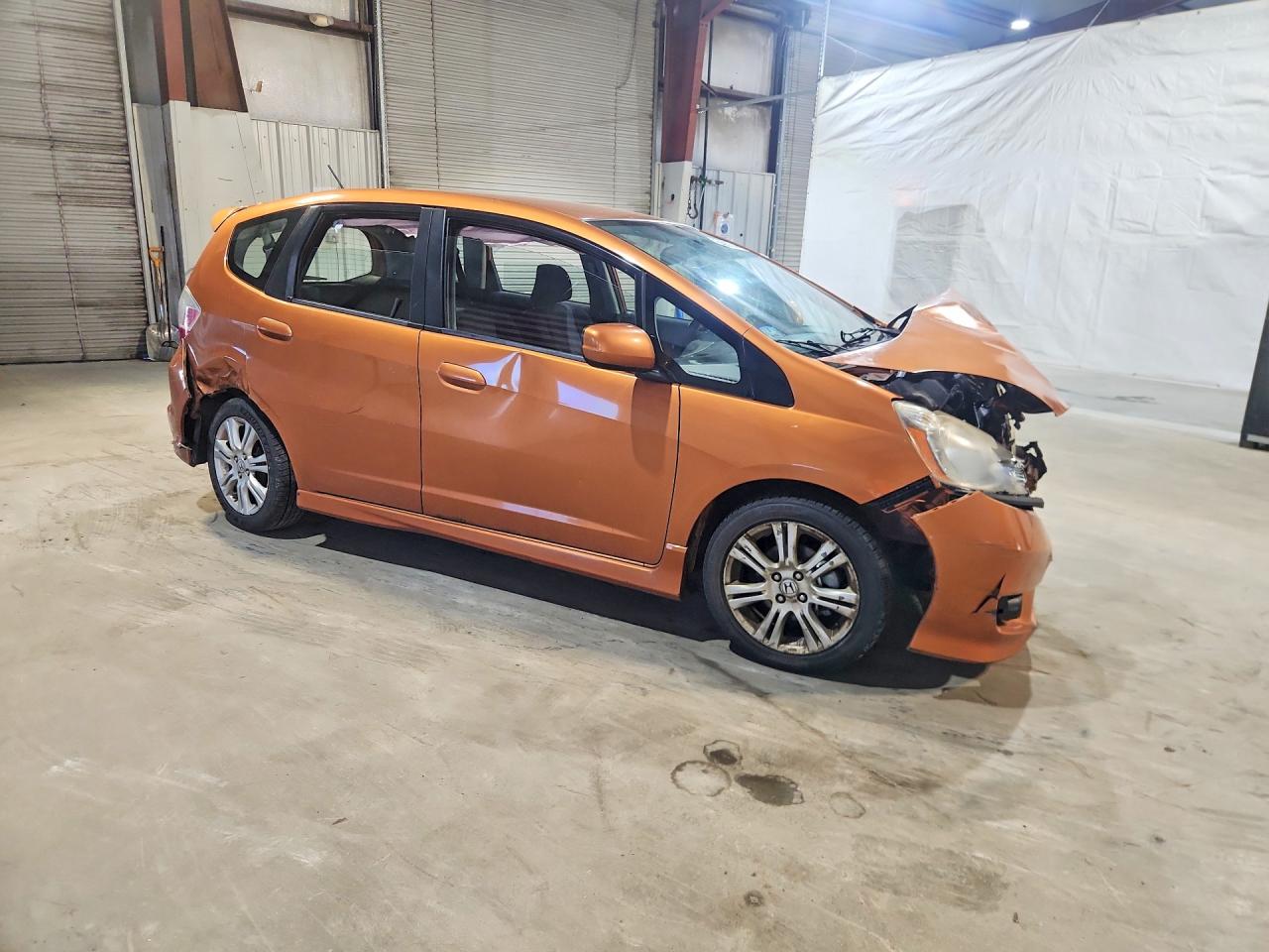 2009 Honda Fit Sport Orange vin: JHMGE88499S048490