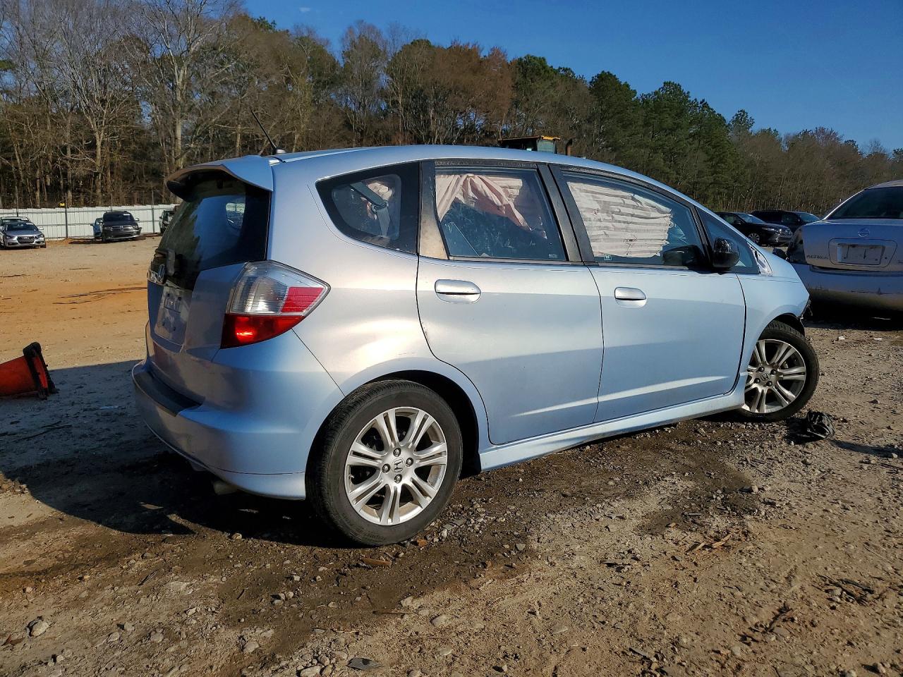 2009 Honda Fit Sport Blue vin: JHMGE884X9C002421