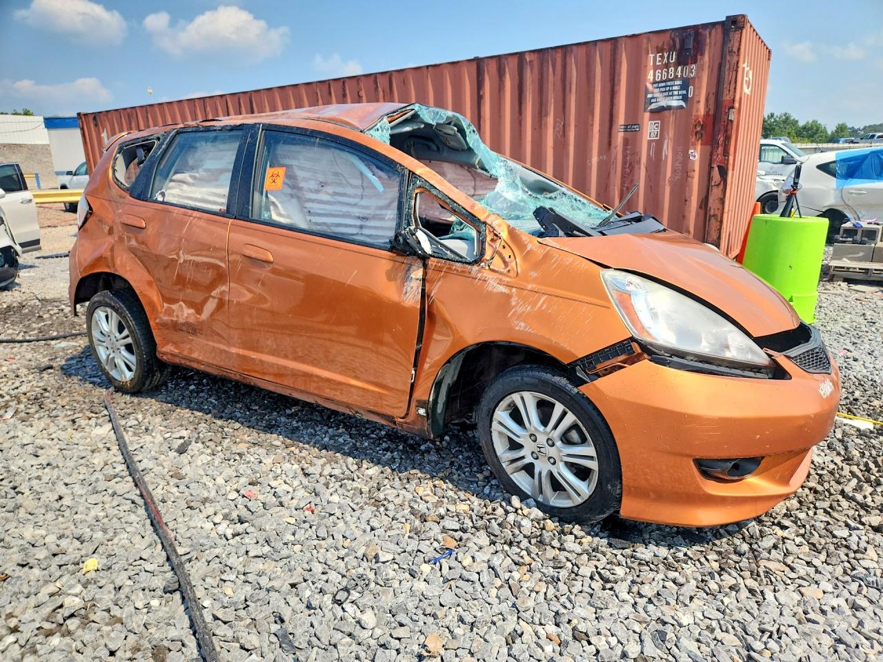 2009 Honda Fit Sport Orange vin: JHMGE884X9S033576