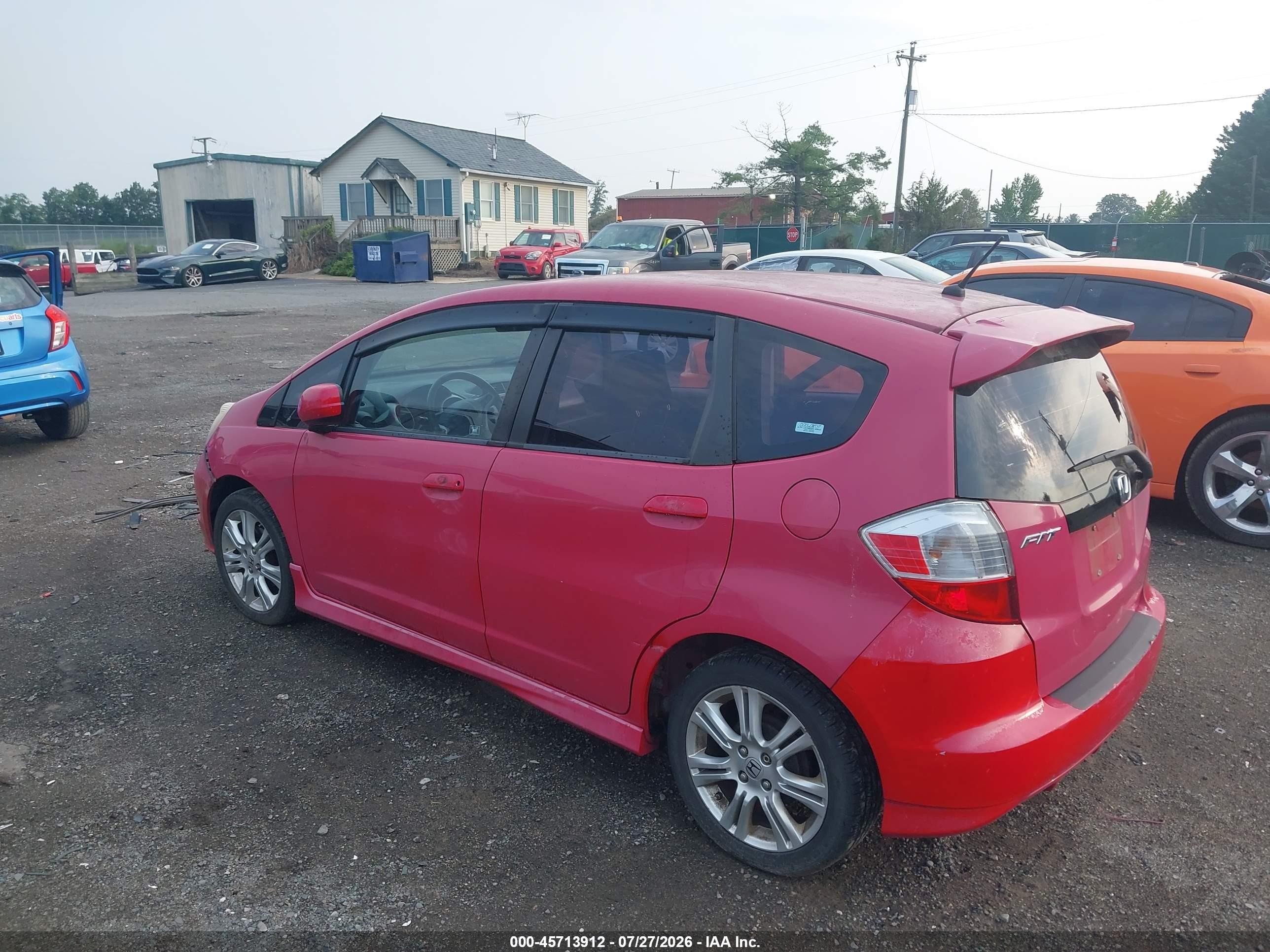 2009 Honda Fit Sport Red vin: JHMGE884X9S036574