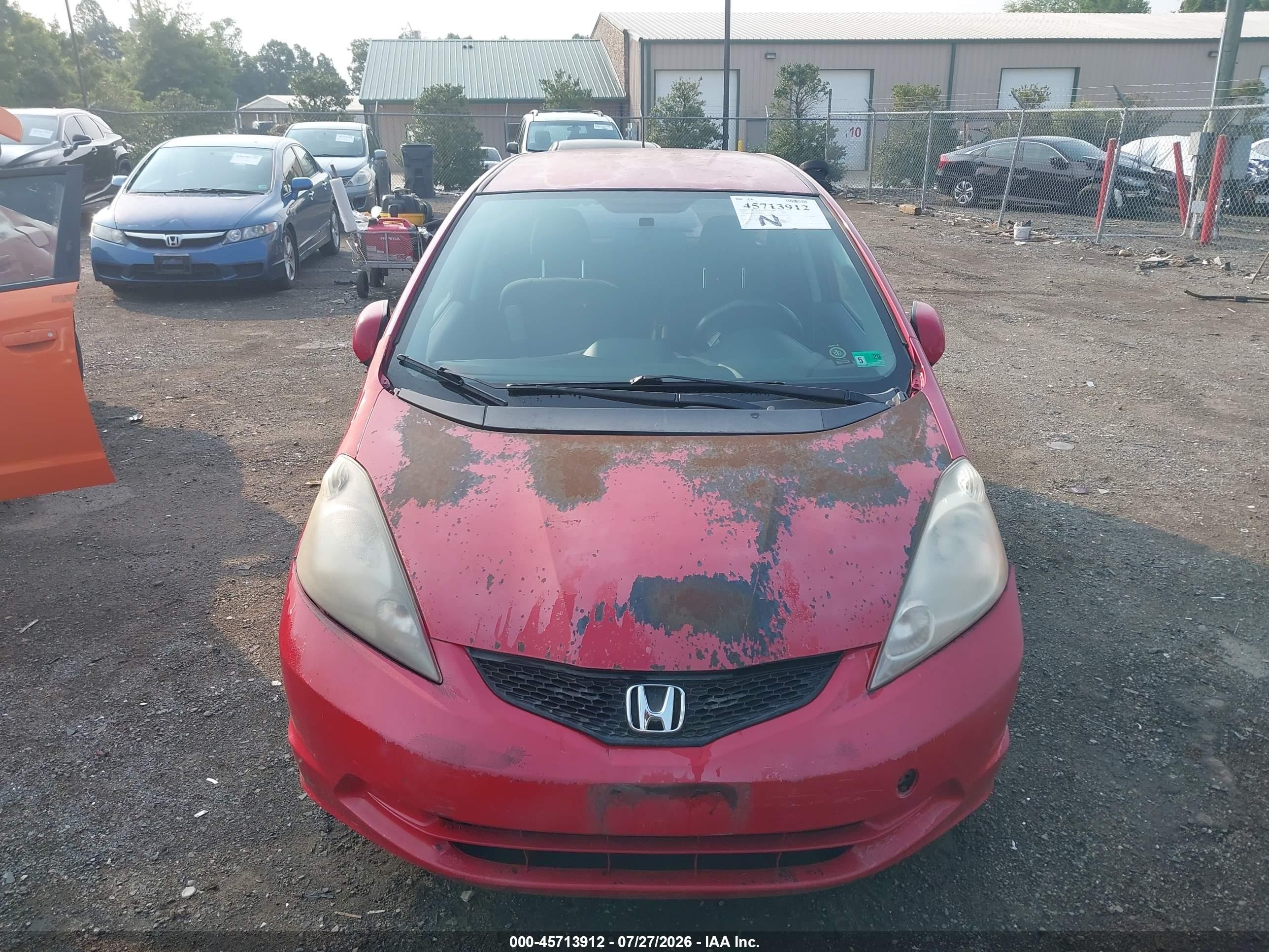 2009 Honda Fit Sport Red vin: JHMGE884X9S036574