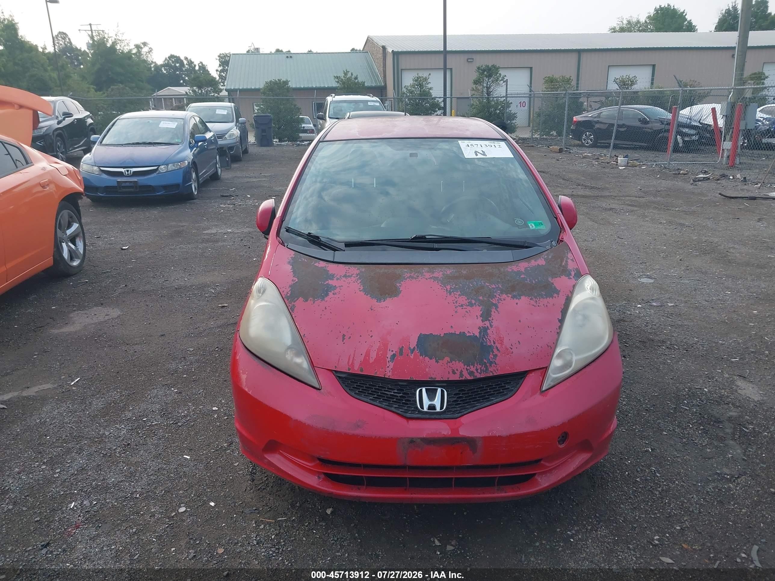 2009 Honda Fit Sport Red vin: JHMGE884X9S036574