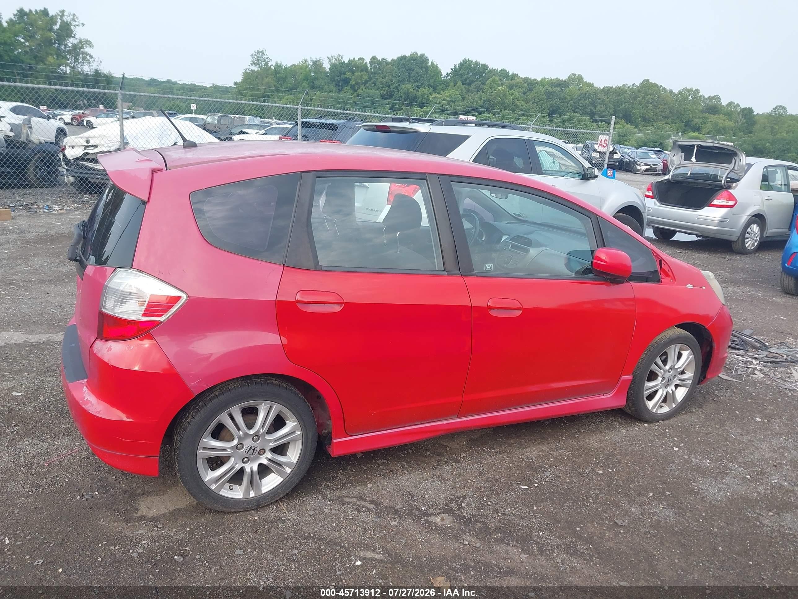2009 Honda Fit Sport Red vin: JHMGE884X9S036574