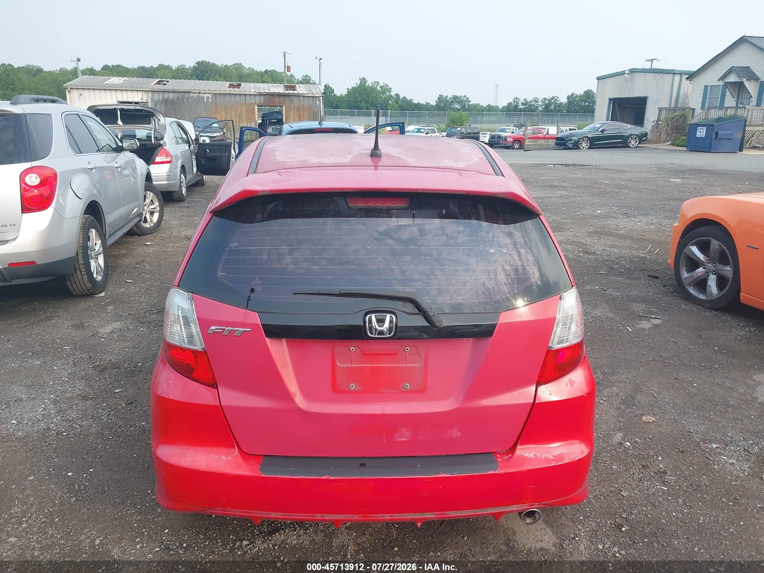 2009 Honda Fit Sport Red vin: JHMGE884X9S036574