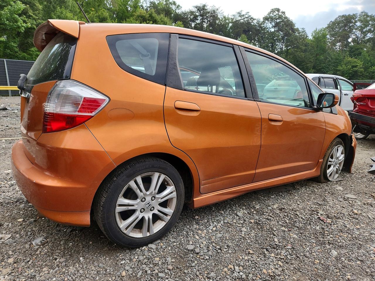 2009 Honda Fit Sport Orange vin: JHMGE884X9S046859