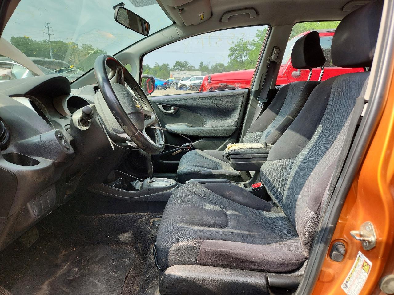 2009 Honda Fit Sport Orange vin: JHMGE884X9S046859
