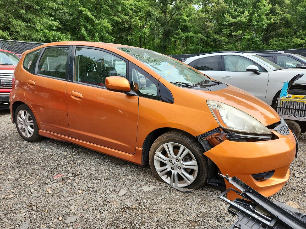 2009 Honda Fit Sport Orange vin: JHMGE884X9S046859