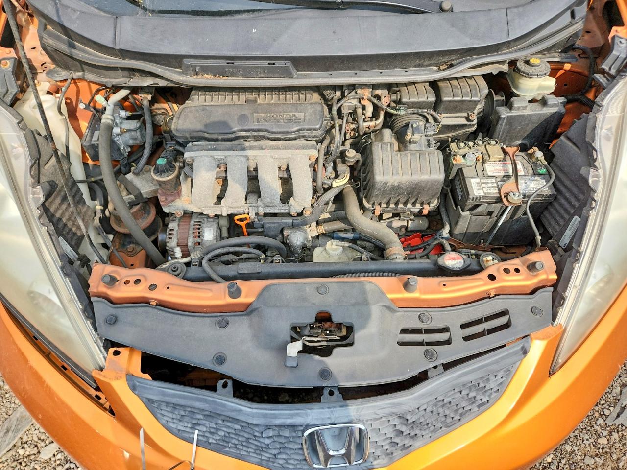 2009 Honda Fit Sport Orange vin: JHMGE884X9S046859