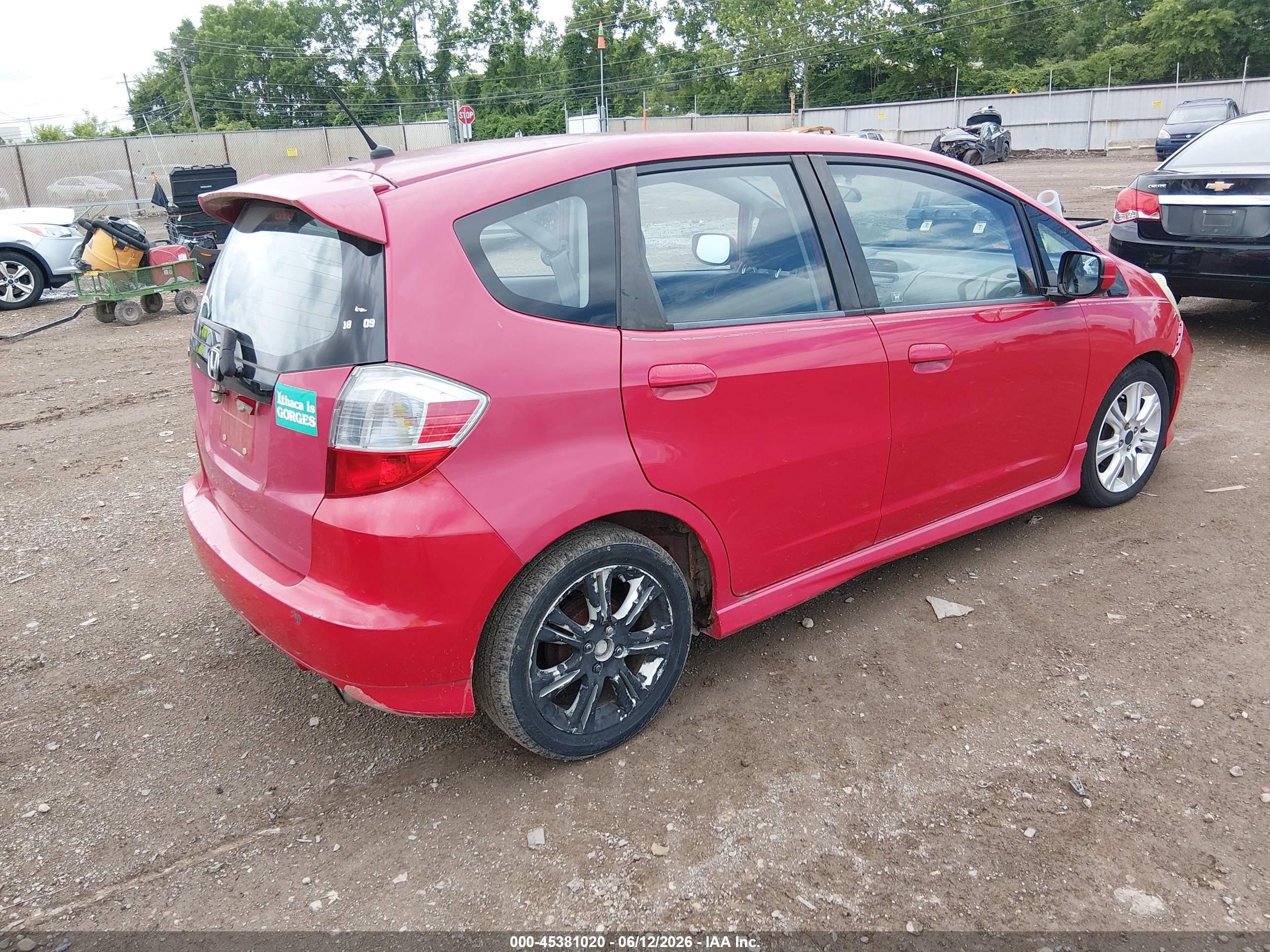 2009 Honda Fit Sport Red vin: JHMGE884X9S050846