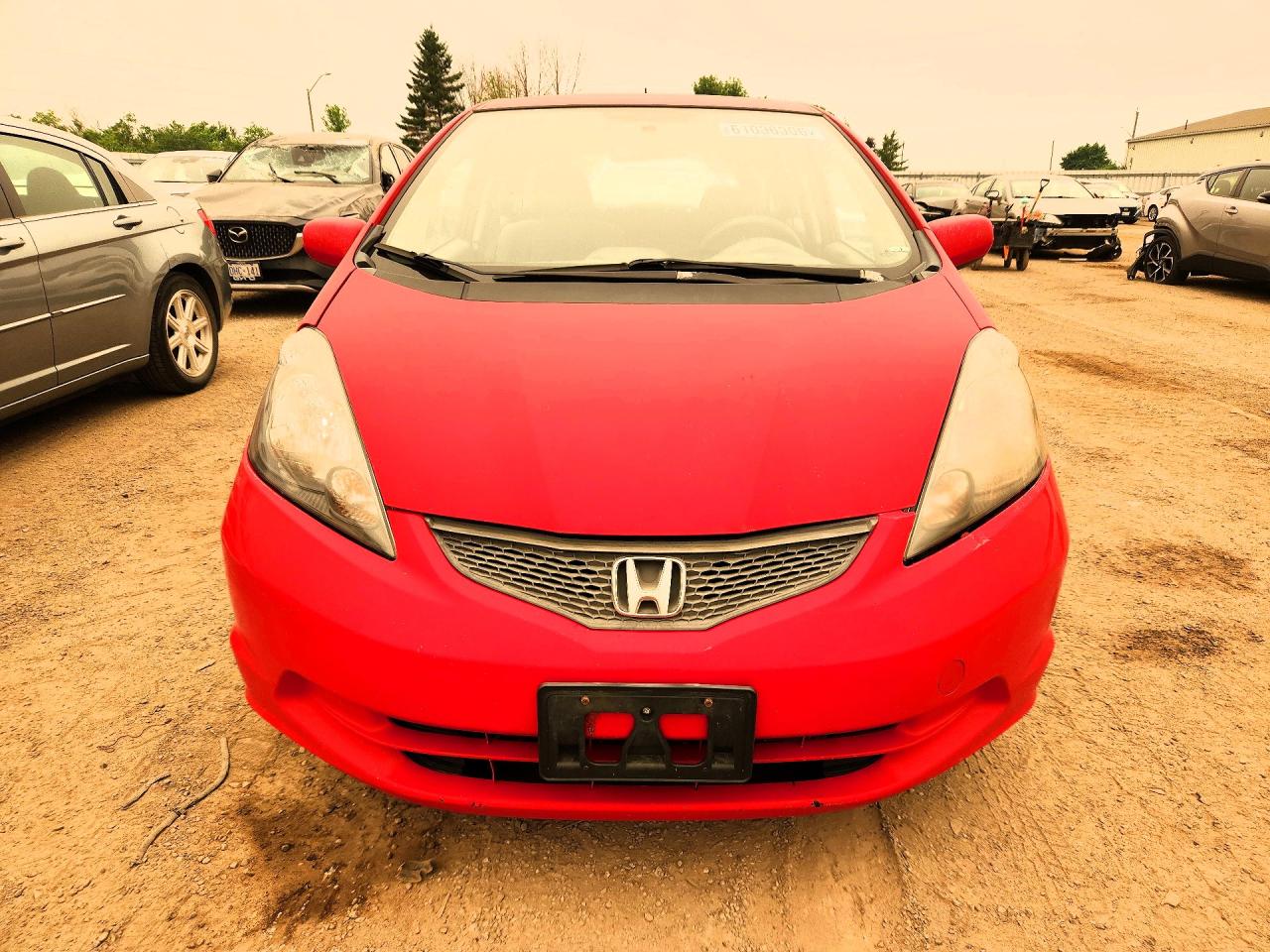 2009 Honda Fit Lx Red vin: JHMGE88539S802637