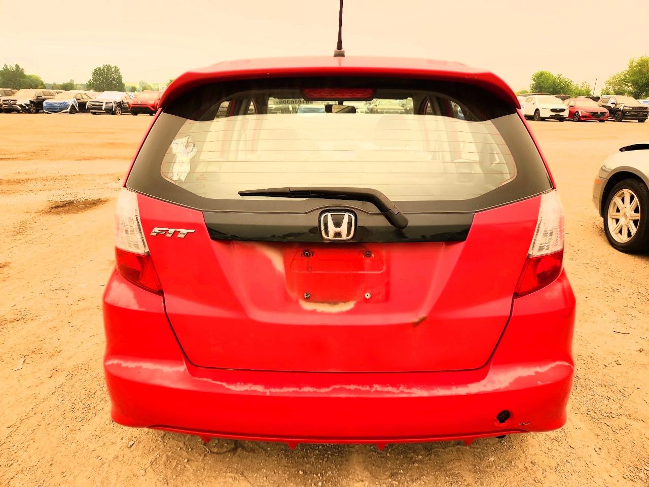 2009 Honda Fit Lx Red vin: JHMGE88539S802637