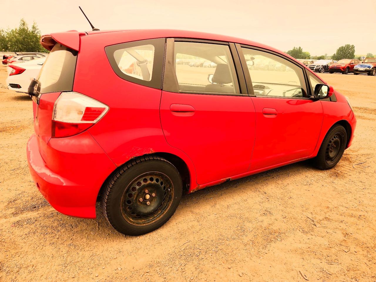 2009 Honda Fit Lx Red vin: JHMGE88539S802637