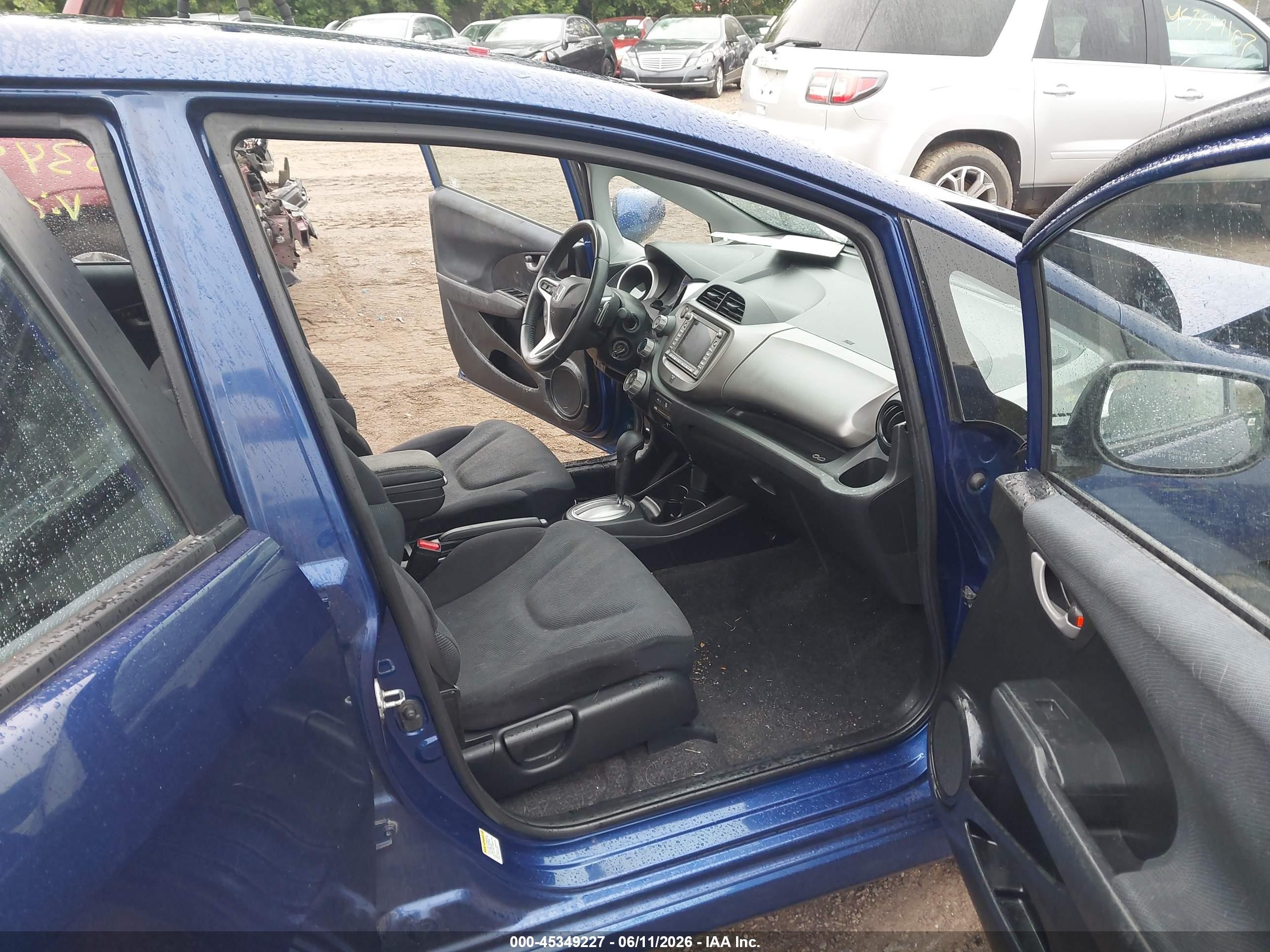 2009 Honda Fit Sport Blue vin: JHMGE88609S008204