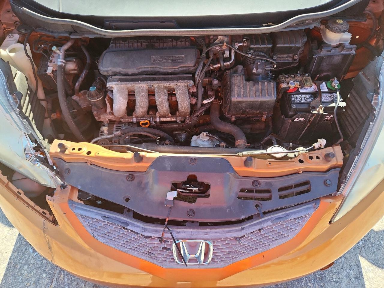2009 Honda Fit Sport Оранжевый vin: JHMGE88639S046901