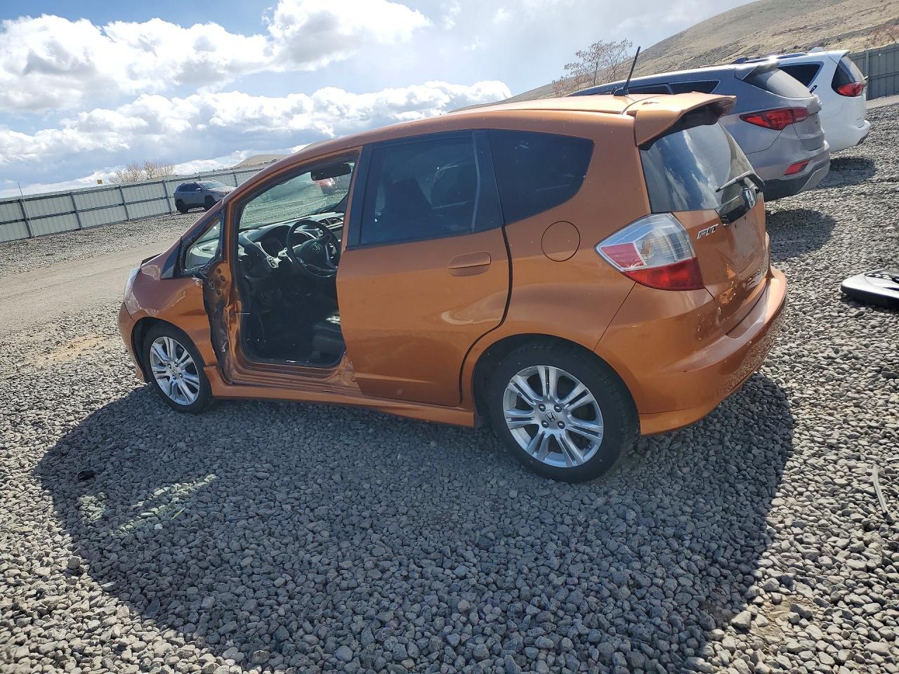 2009 Honda Fit Sport Orange vin: JHMGE88659S044180