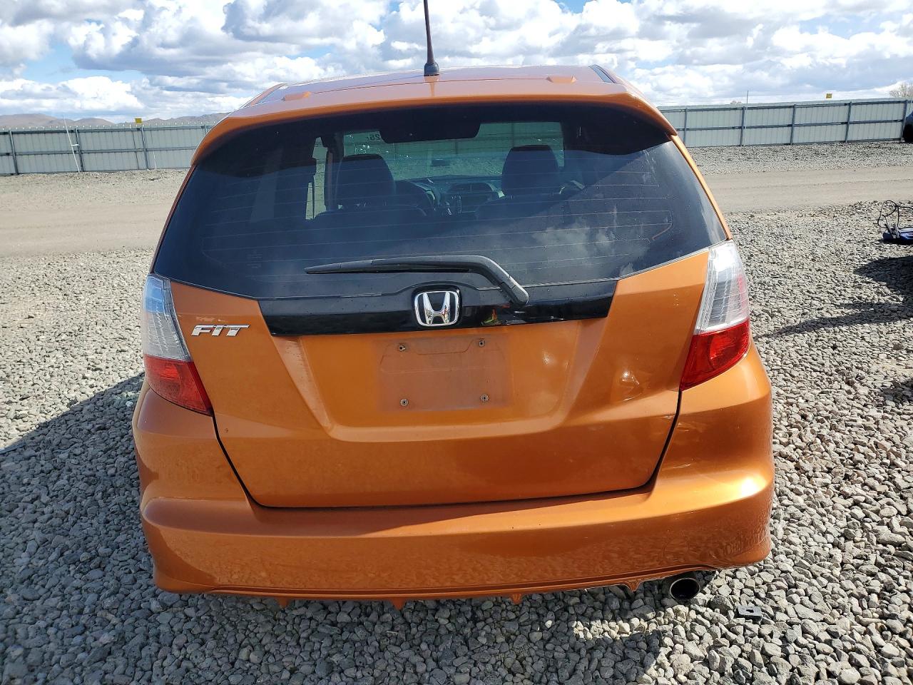 2009 Honda Fit Sport Orange vin: JHMGE88659S044180