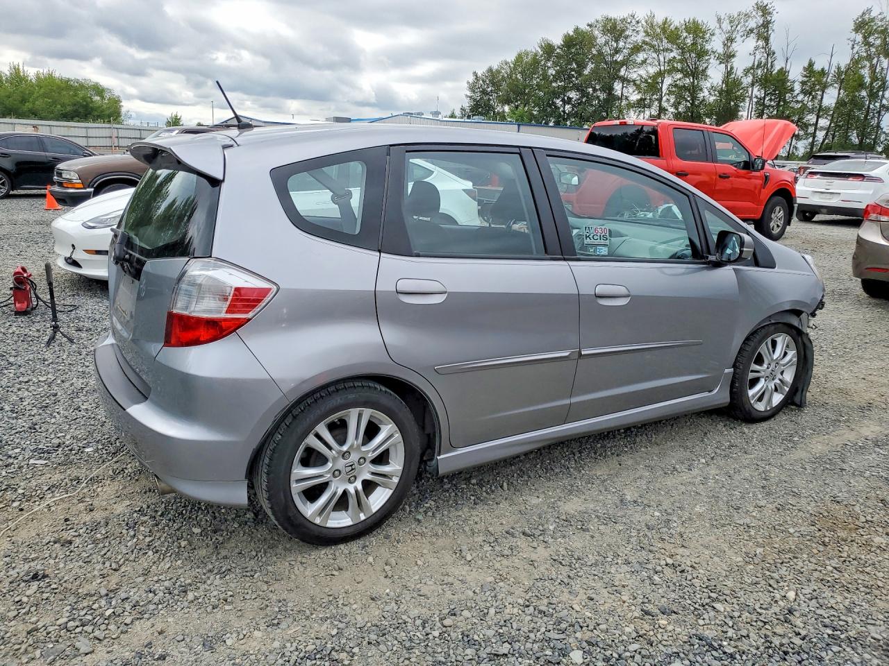 2009 Honda Fit Sport Silver vin: JHMGE88669S006554
