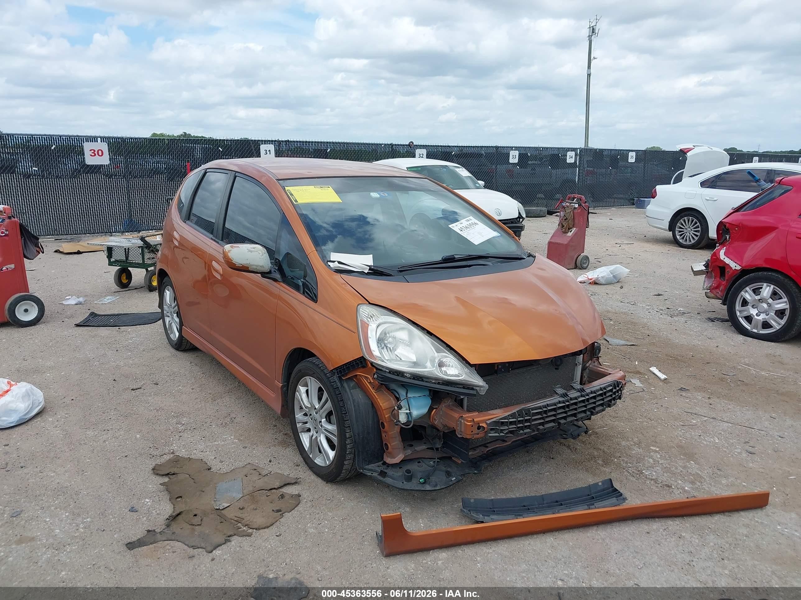 2009 Honda Fit Sport Orange vin: JHMGE88699S016267
