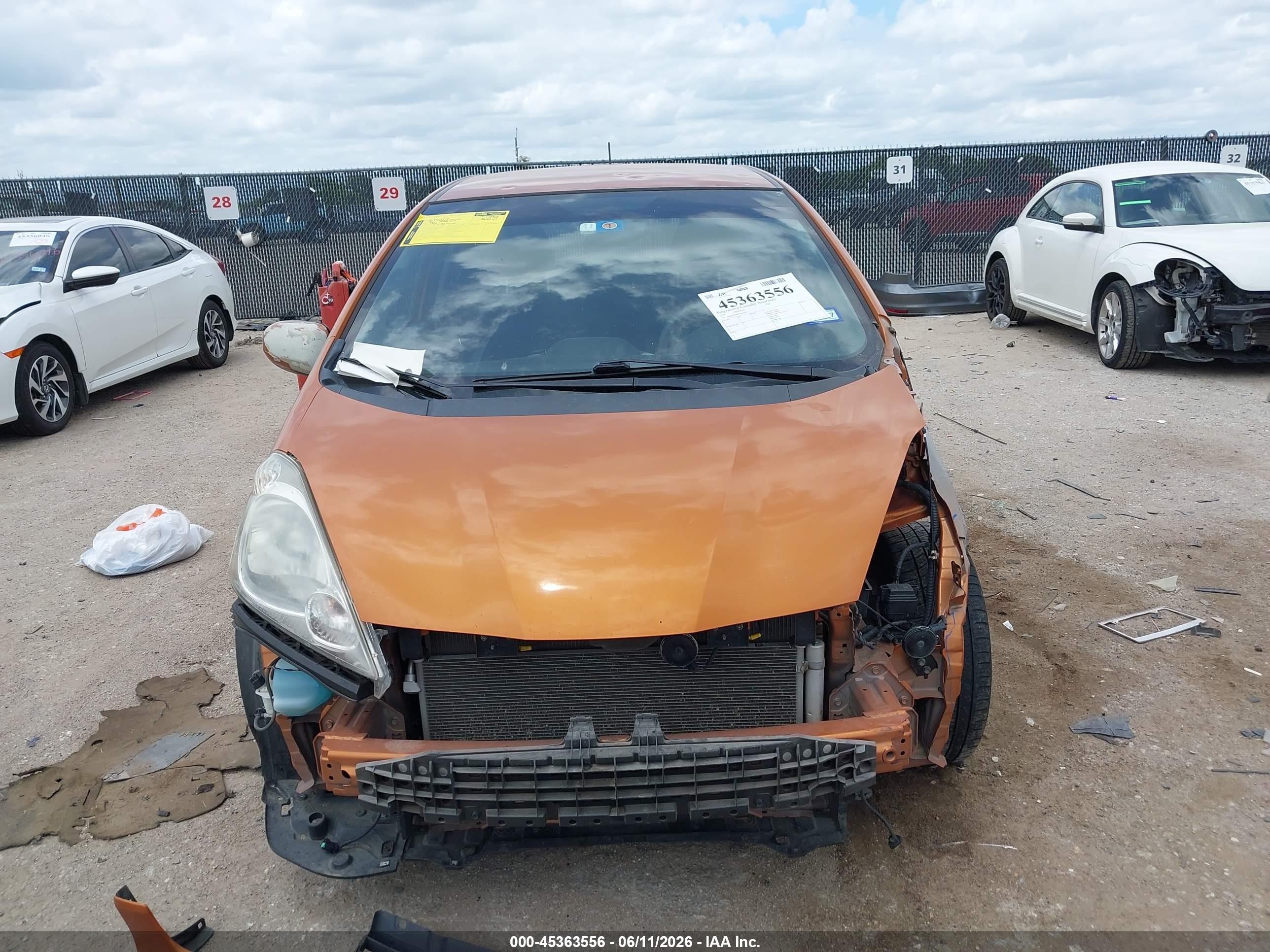 2009 Honda Fit Sport Orange vin: JHMGE88699S016267