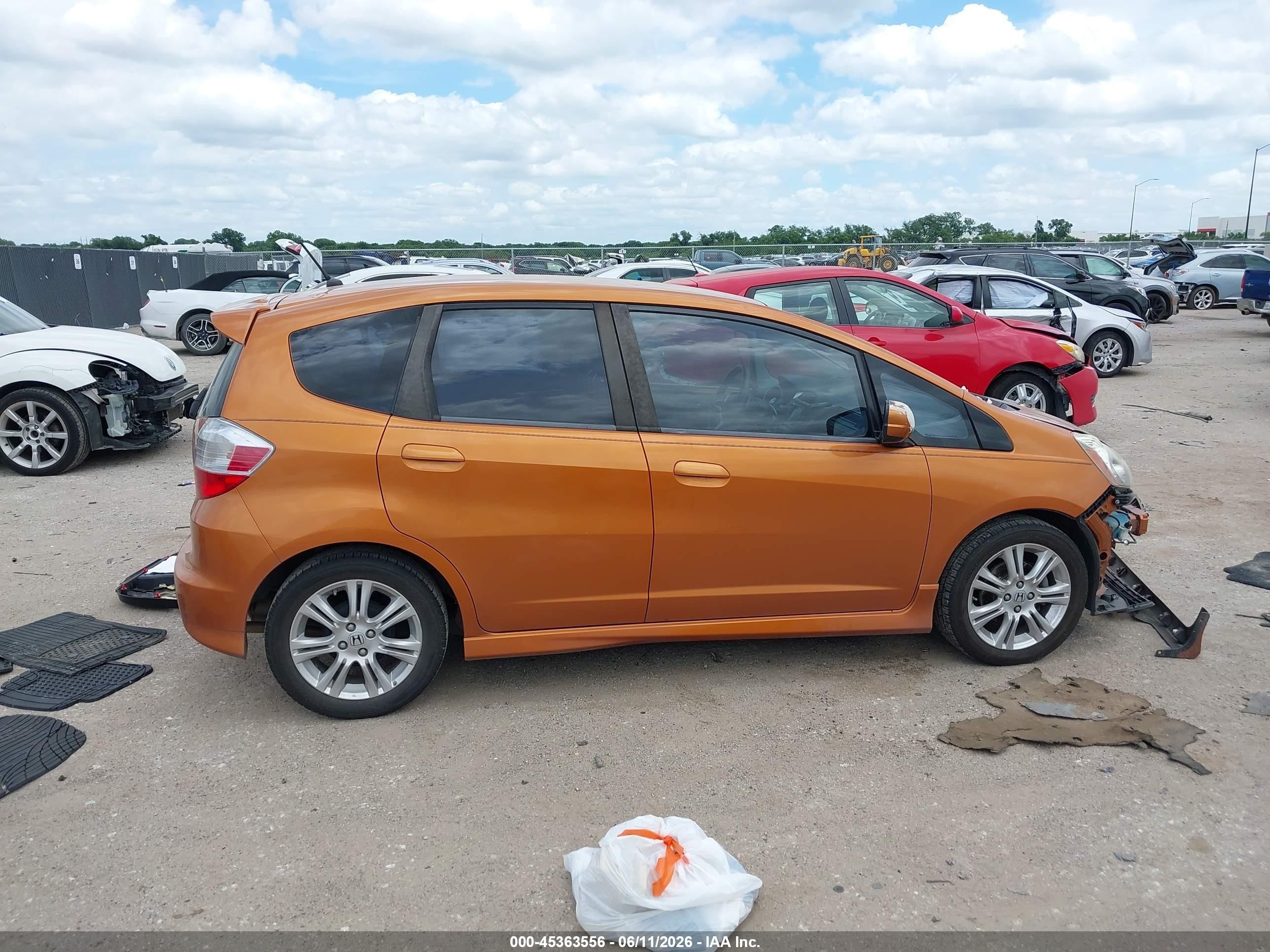 2009 Honda Fit Sport Orange vin: JHMGE88699S016267