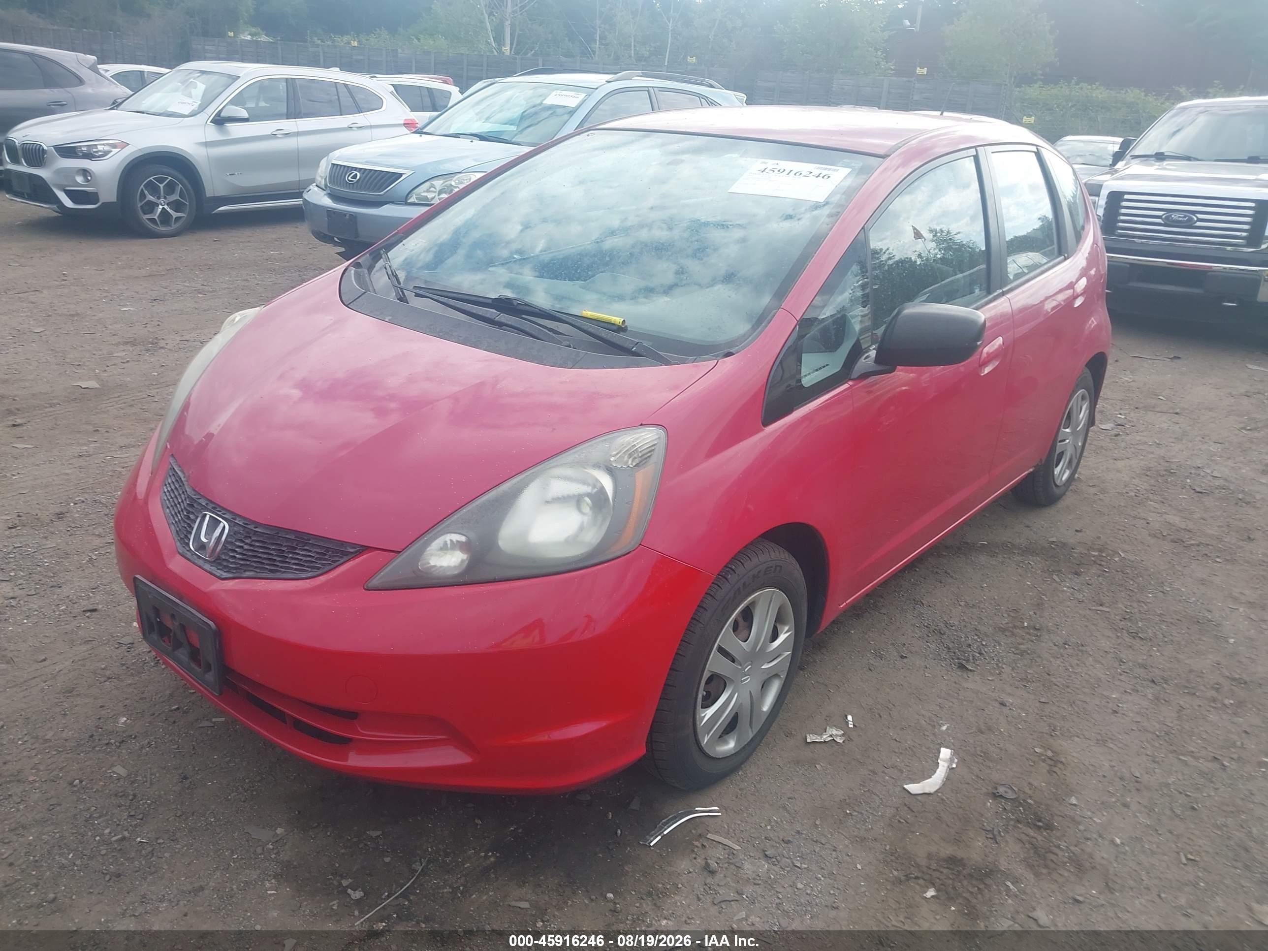 2010 Honda Fit   Red vin: JHMGE8G29AS002680