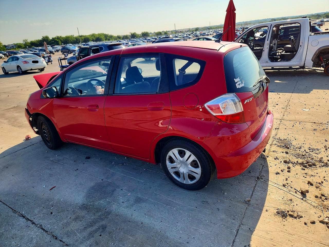 2011 Honda Fit Red vin: JHMGE8G31BC008722