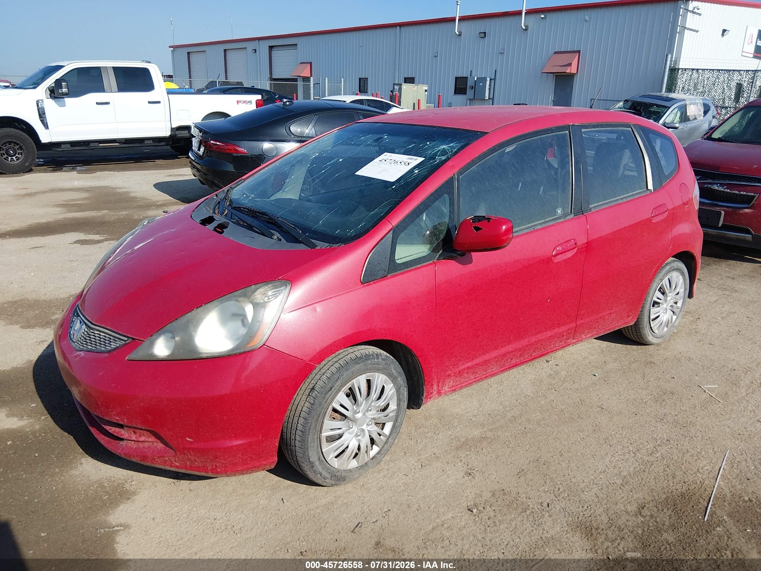 2013 Honda Fit   Red vin: JHMGE8G31DC056174
