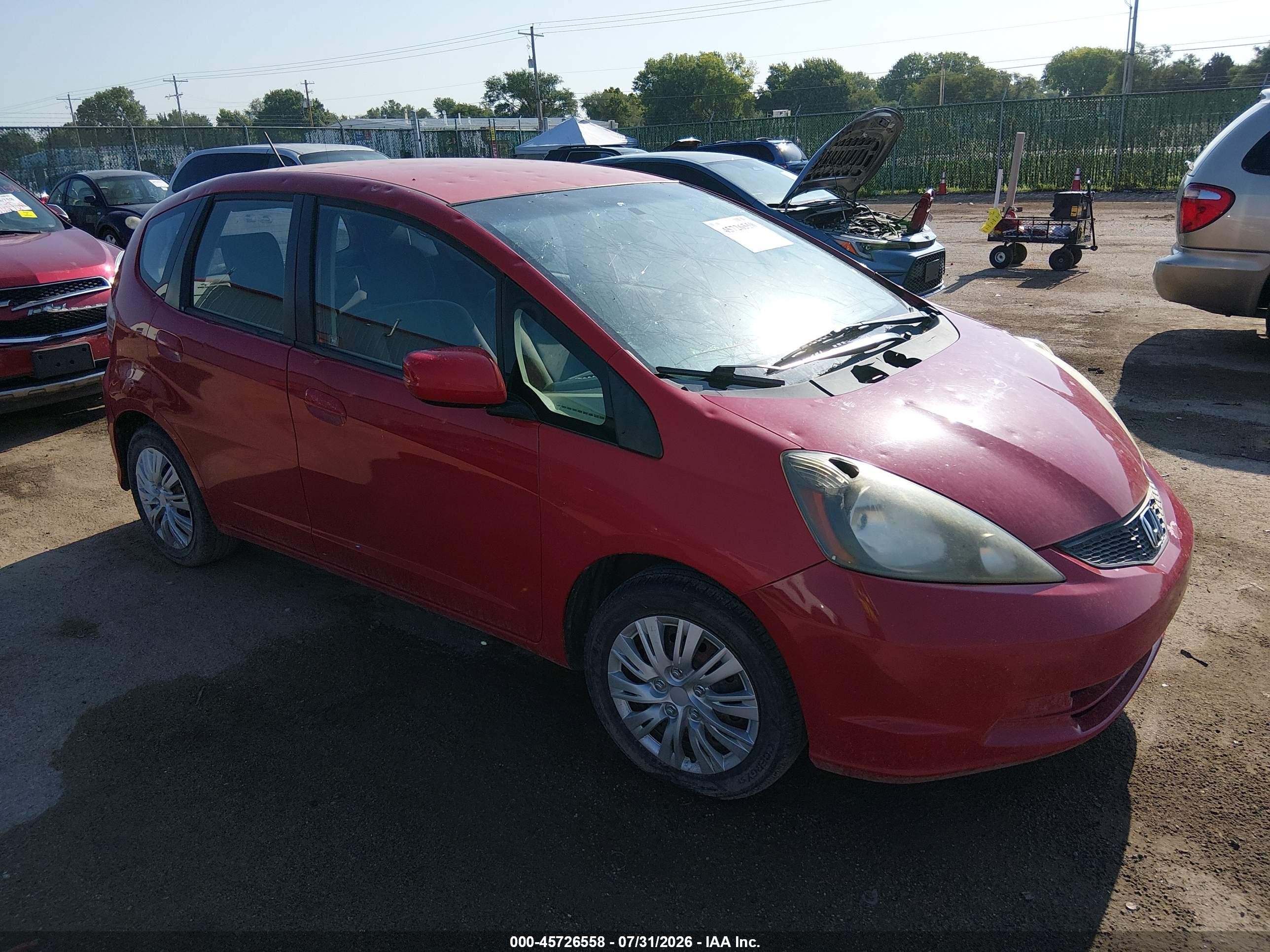 2013 Honda Fit   Red vin: JHMGE8G31DC056174