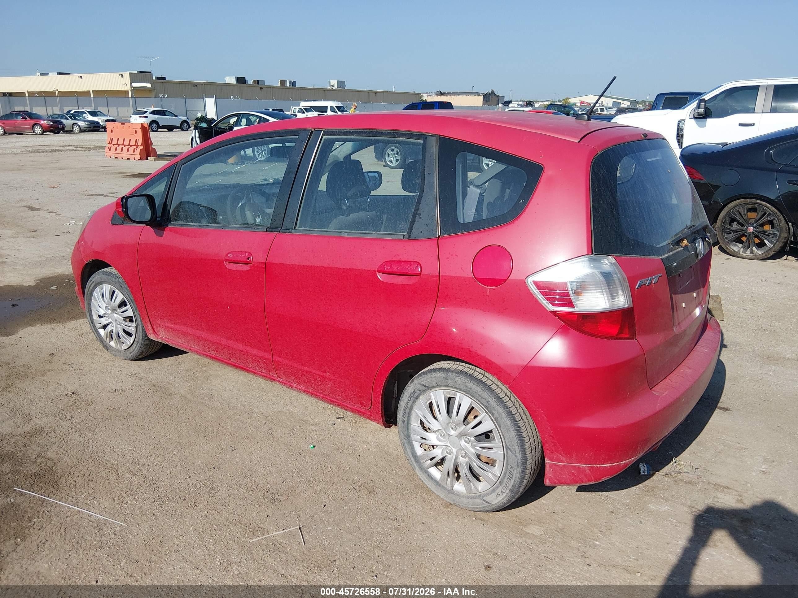 2013 Honda Fit   Red vin: JHMGE8G31DC056174