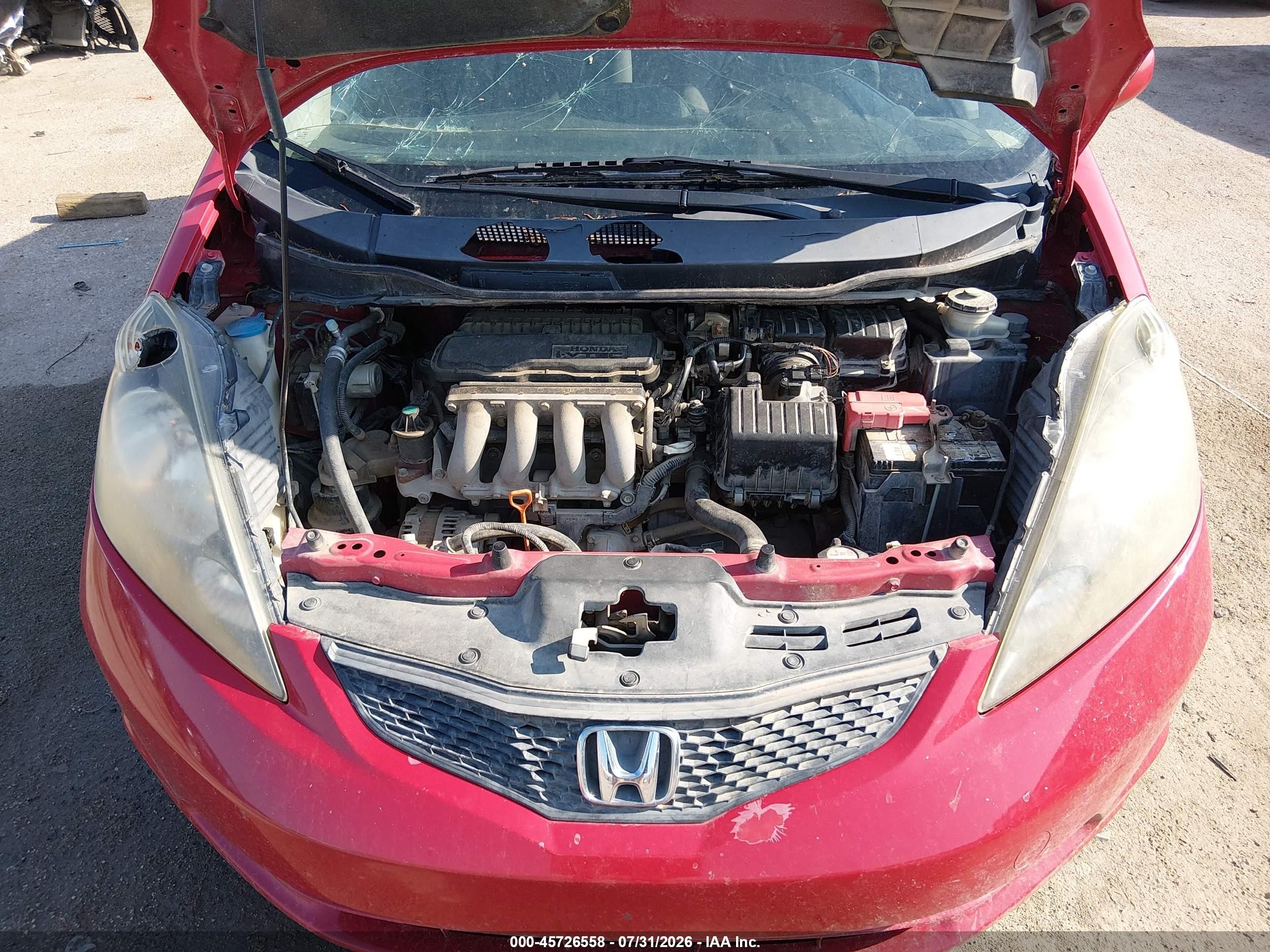 2013 Honda Fit   Red vin: JHMGE8G31DC056174