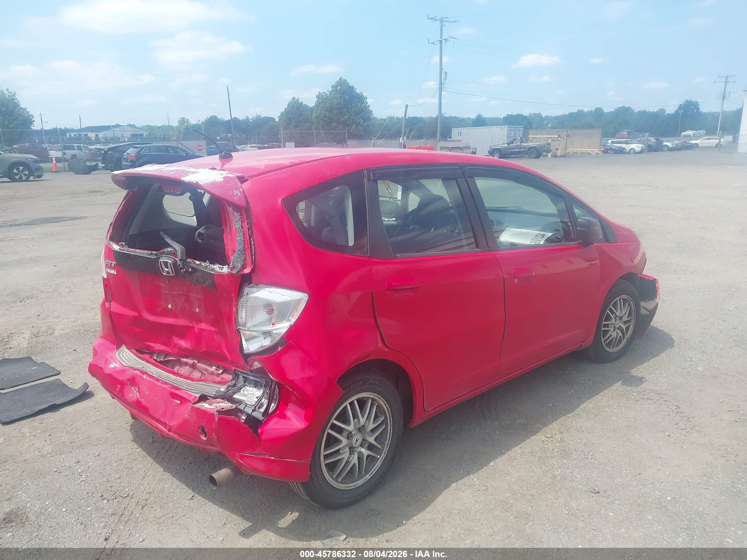 2011 Honda Fit   Red vin: JHMGE8G35BS001147