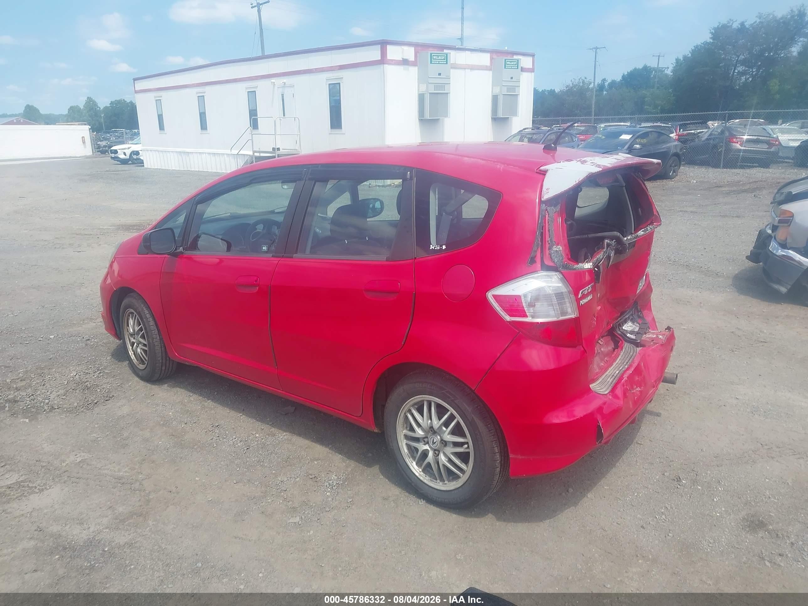 2011 Honda Fit   Red vin: JHMGE8G35BS001147